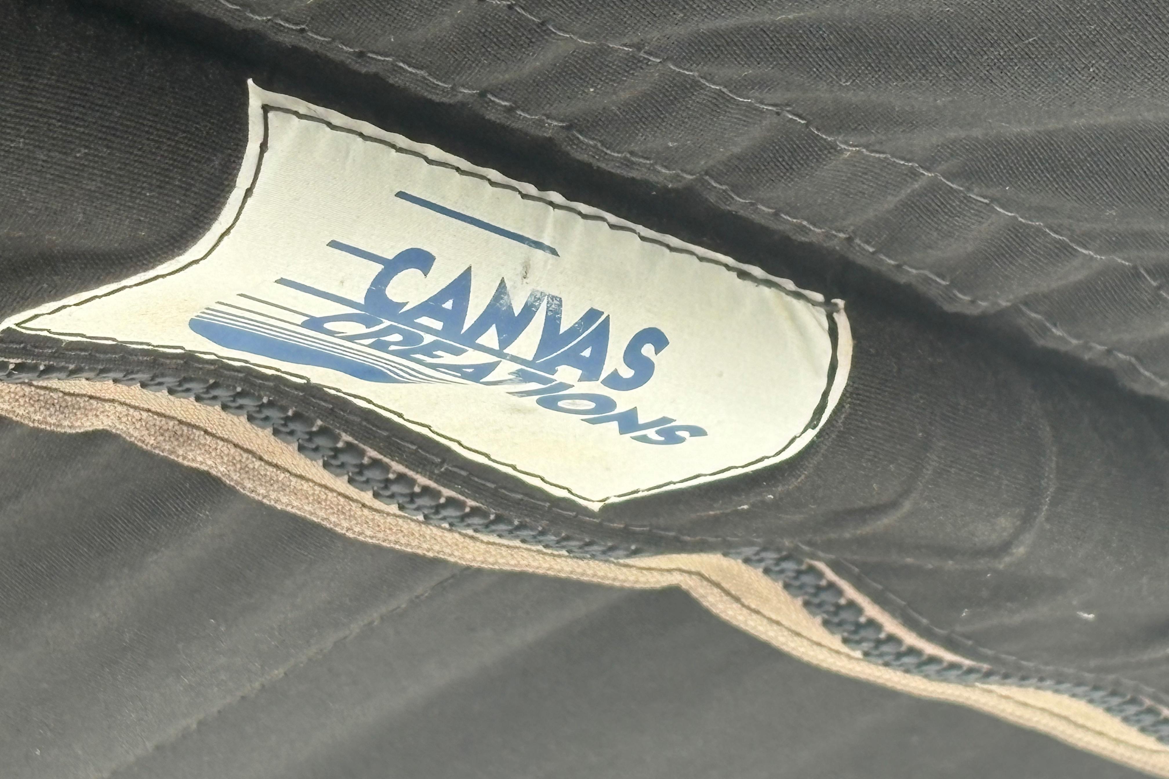 Canvas Creations label on black fabric, Sabre 31, 1981 model.