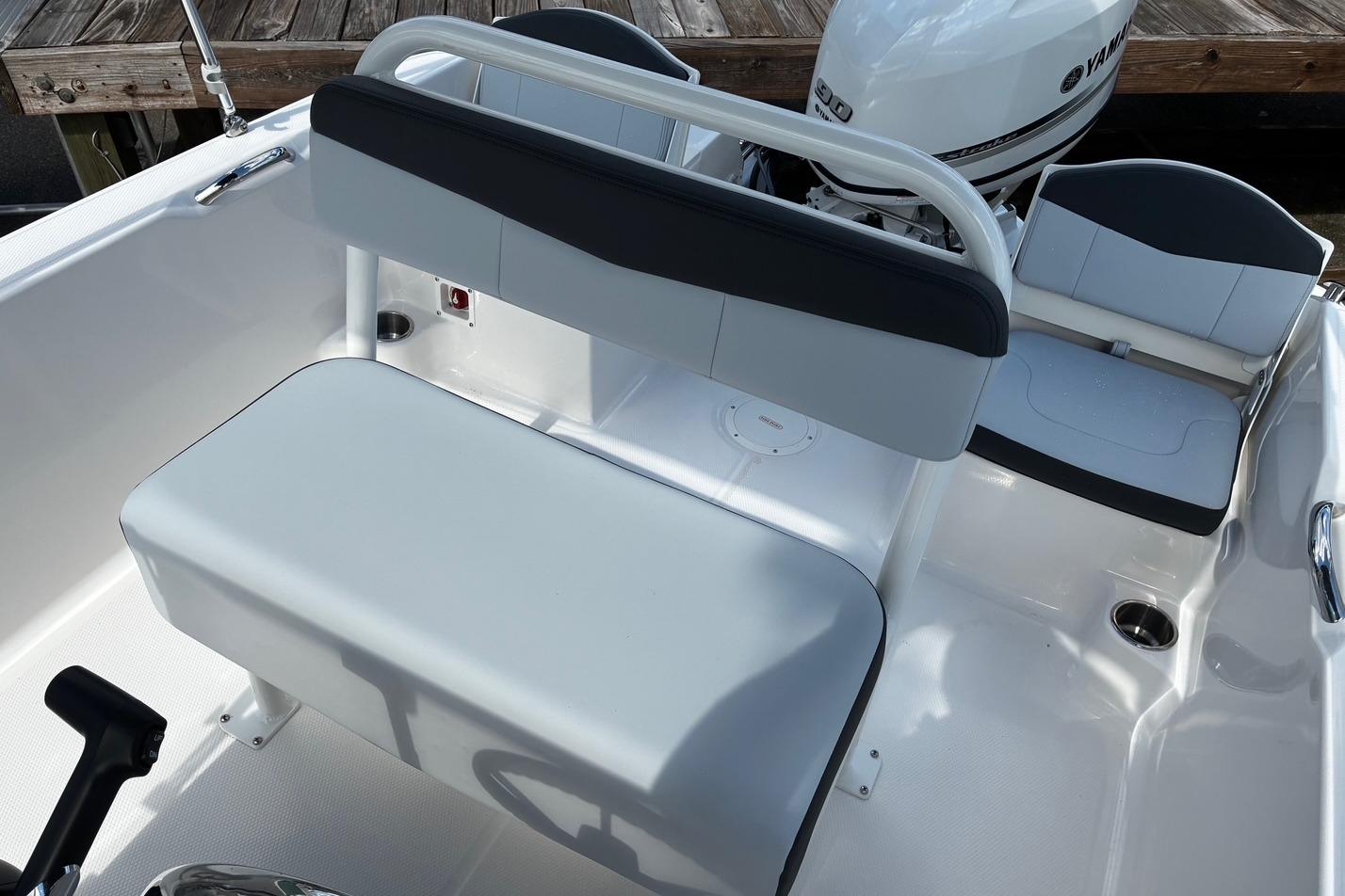 2026 Robalo R160 Center Console boat interior with seating and Yamaha engine.