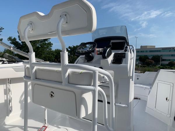 2024 Tahoe 2150 CC boat interior with steering console and seating.