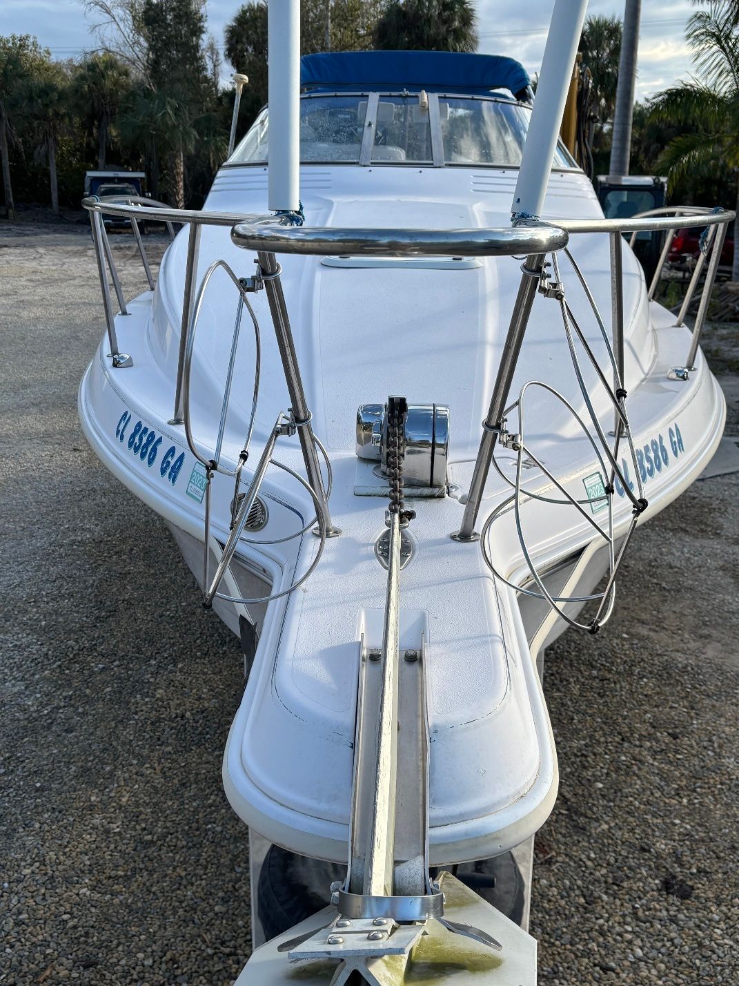1997 Donzi 275LXC boat, front view with anchor and railings.