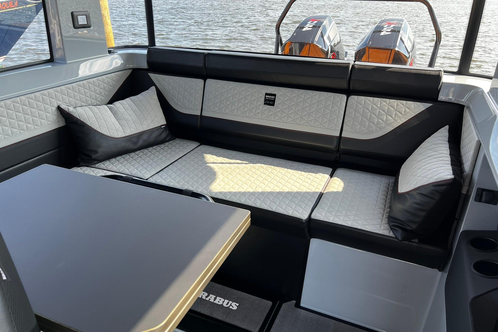 Luxurious interior of 2024 BRABUS Shadow 900 XC Cross Cabin with quilted seating.