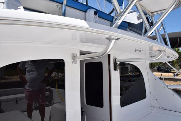 Extended overhang, rear windows are glass