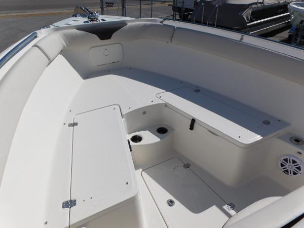 2024 Sailfish 242 CC boat interior with seating and storage compartments.