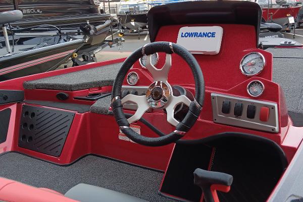 2025 Nitro Z19 boat dashboard with steering wheel and Lowrance electronics.