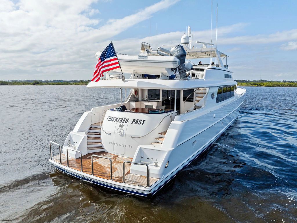 1999 Westport 112 luxury yacht cruising on open water.