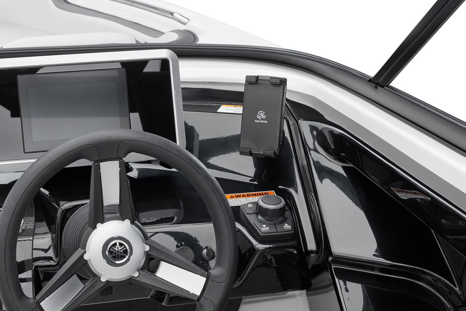 Manufacturer Provided Image: 2026 Yamaha AR250 boat dashboard with steering wheel and navigation controls.