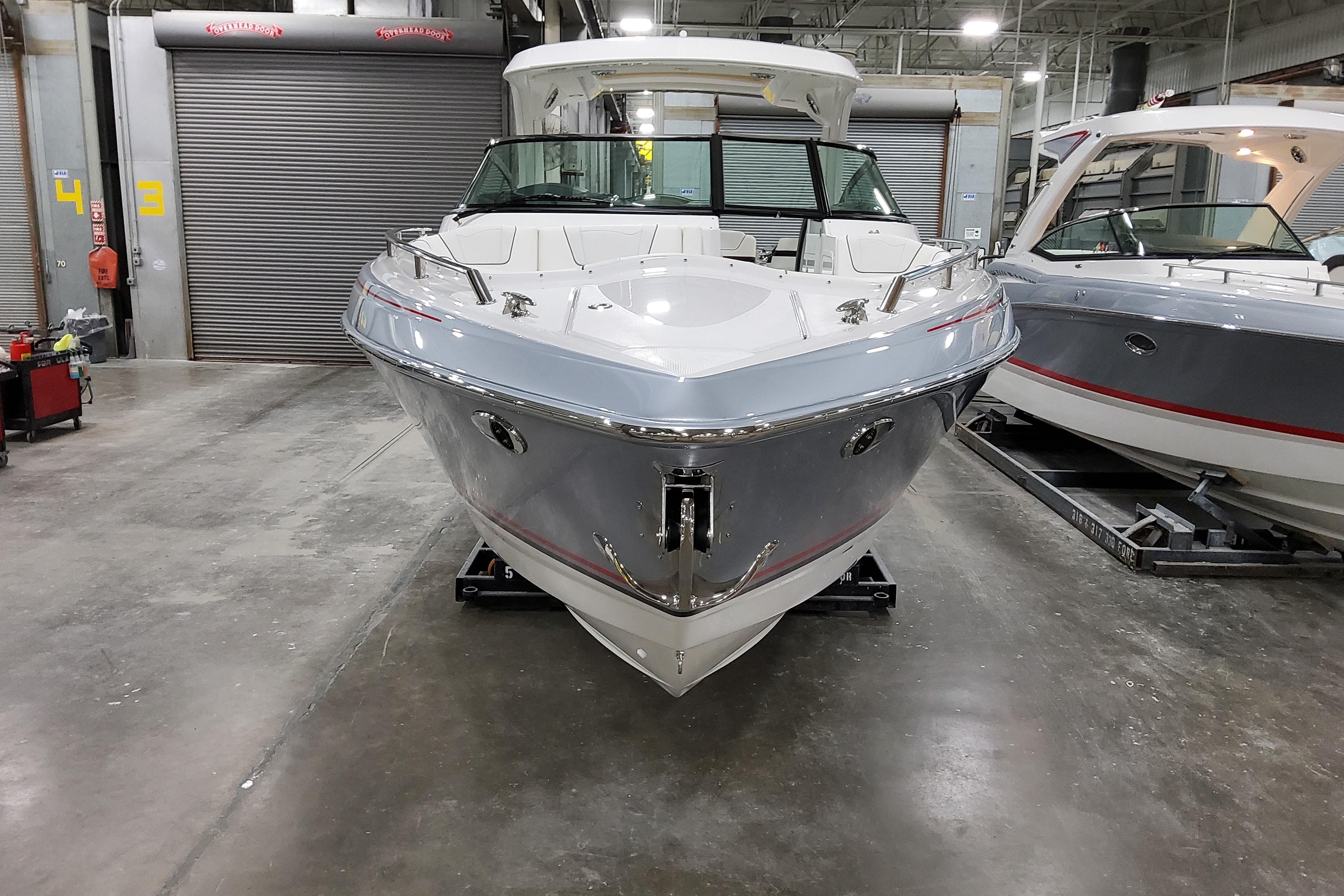 2027 Formula 350 Crossover Bowrider I/O in showroom, front view.