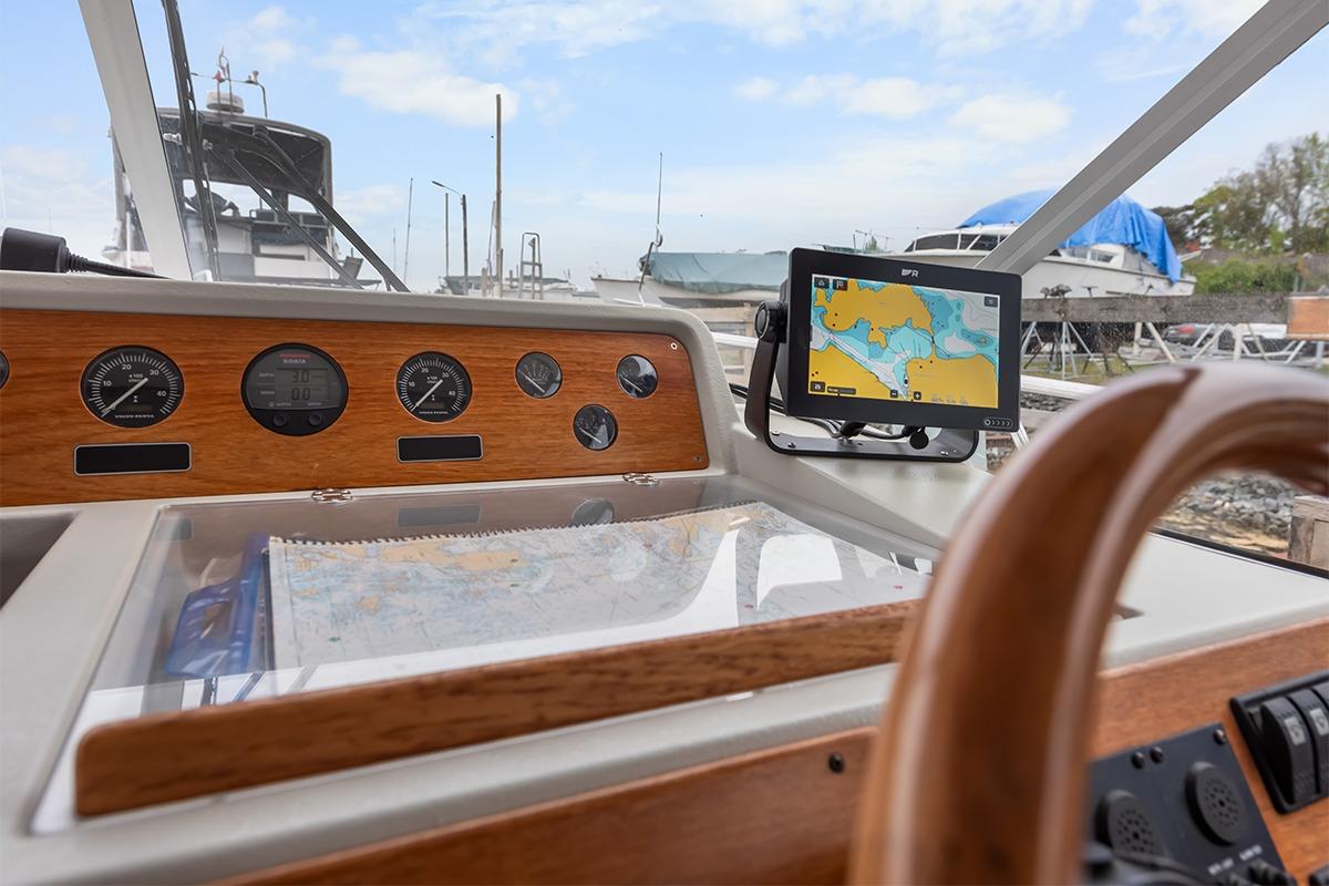 Helm of 2000 Nimbus 380 Carisma with navigation equipment and gauges.