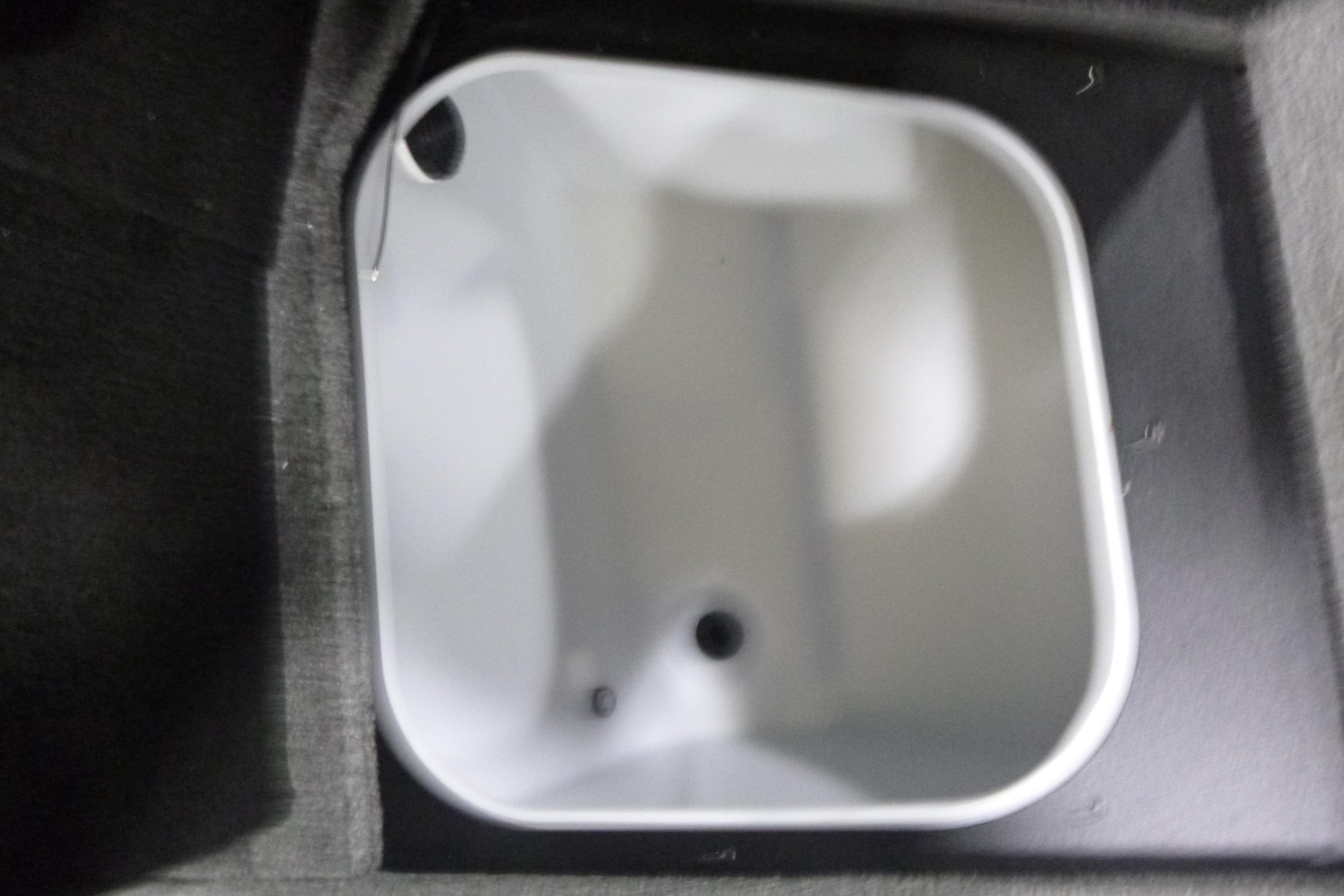 Livewell compartment in 2026 Alumacraft Trophy 205X Sport boat interior.