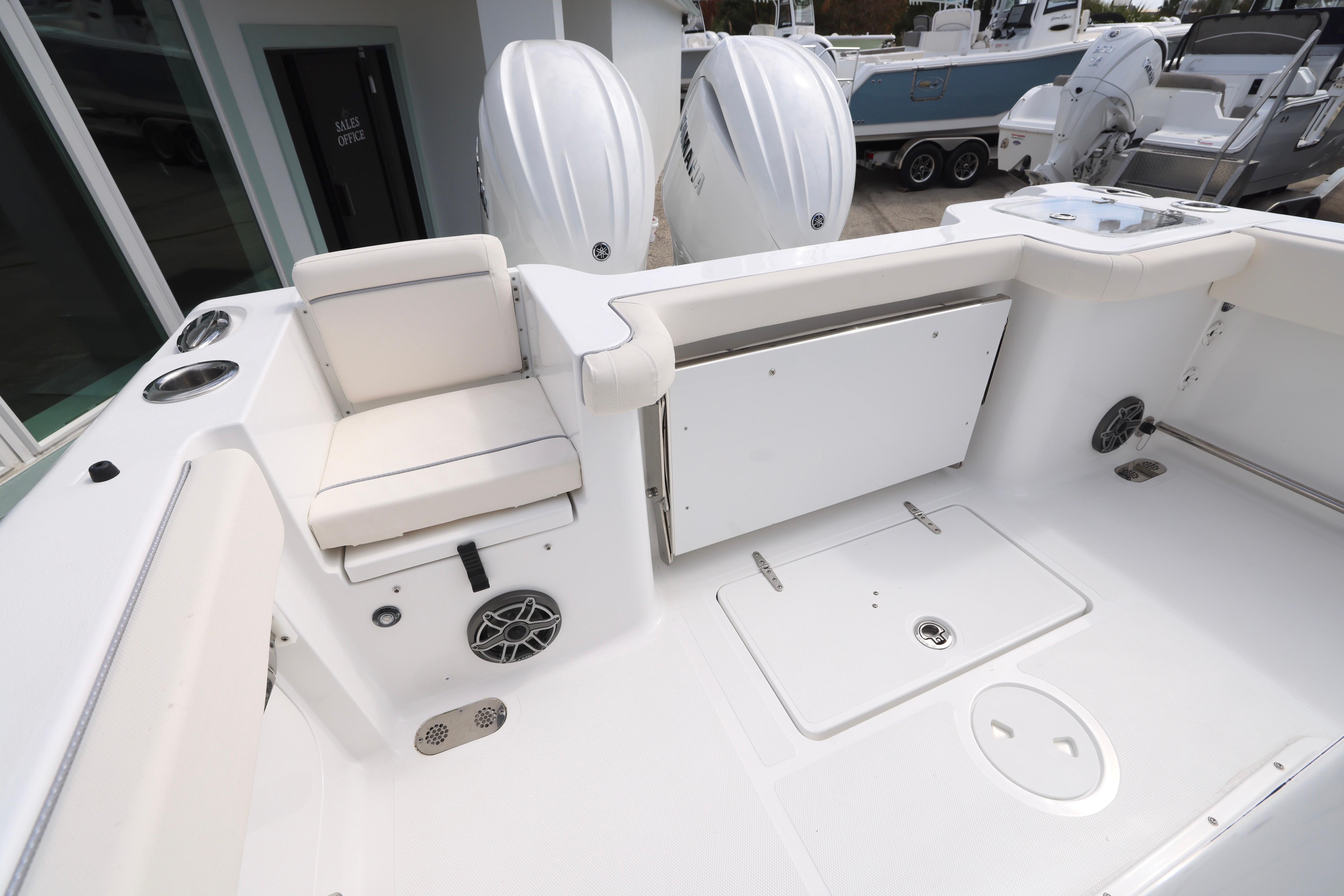 2026 Sea Hunt Gamefish 25 boat interior with seating and storage compartments.