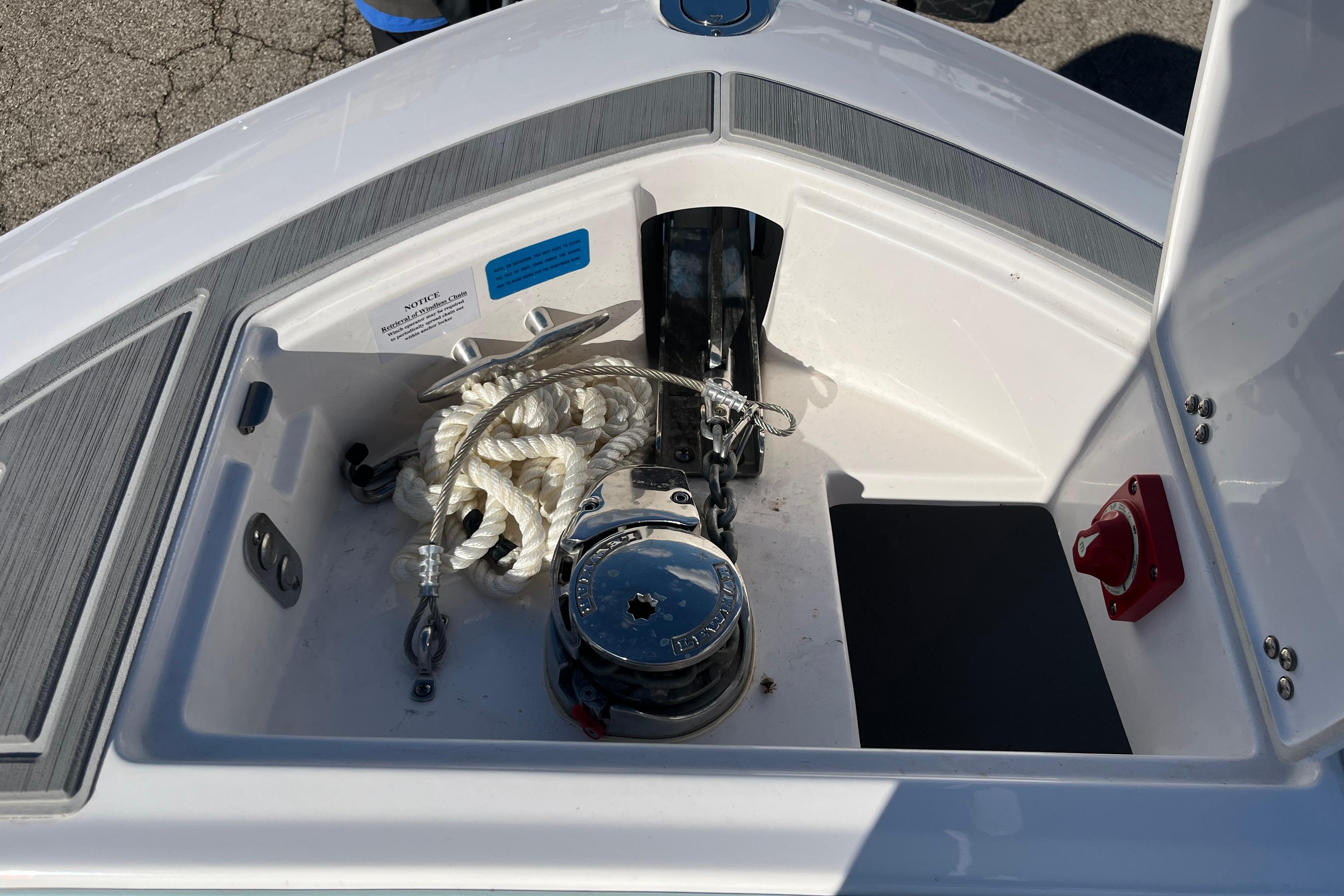 2024 Regal LS9 Surf boat anchor compartment with rope and winch.