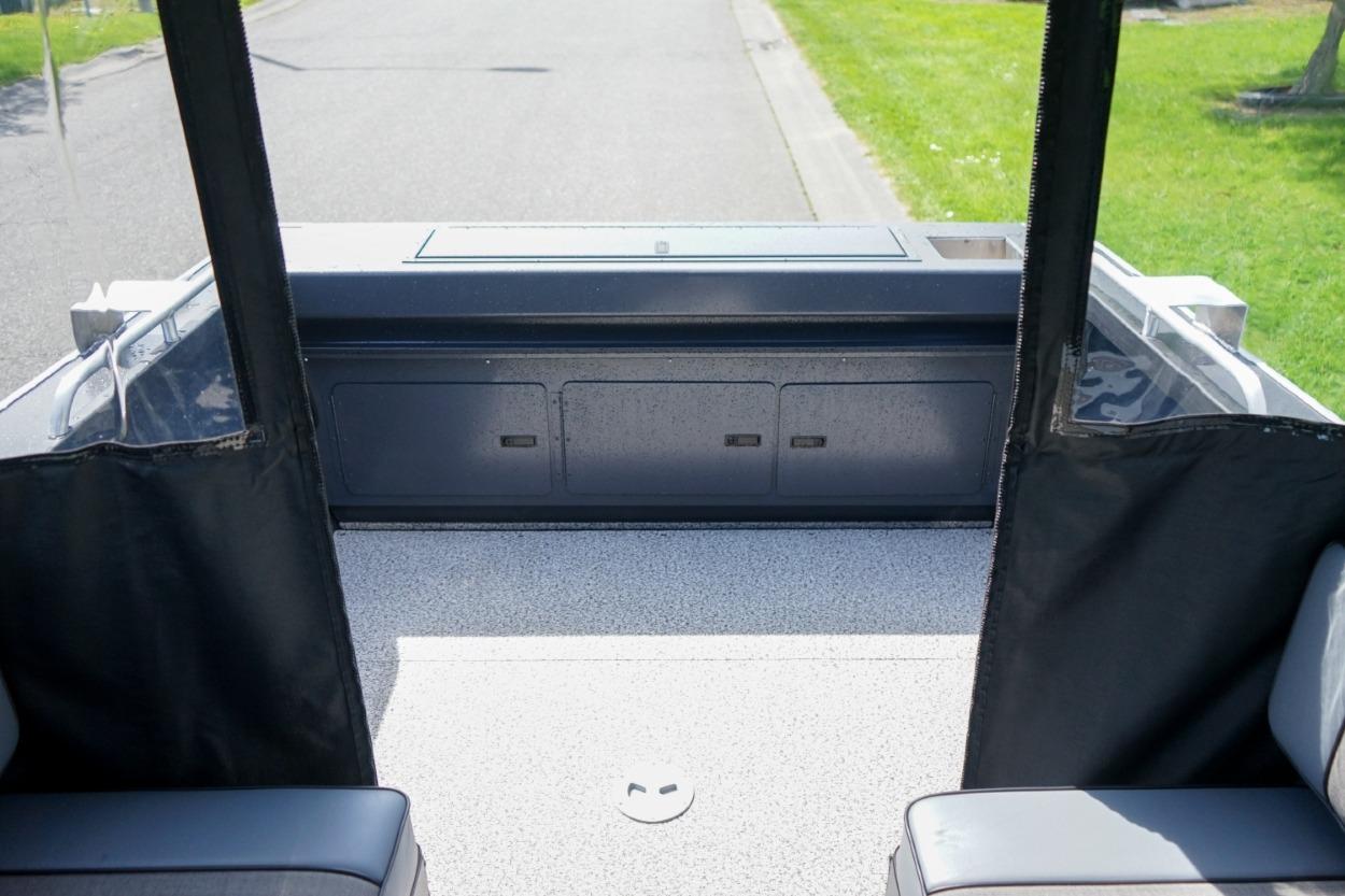2026 Alumaweld X202 Stryker boat interior with seating and storage compartments.
