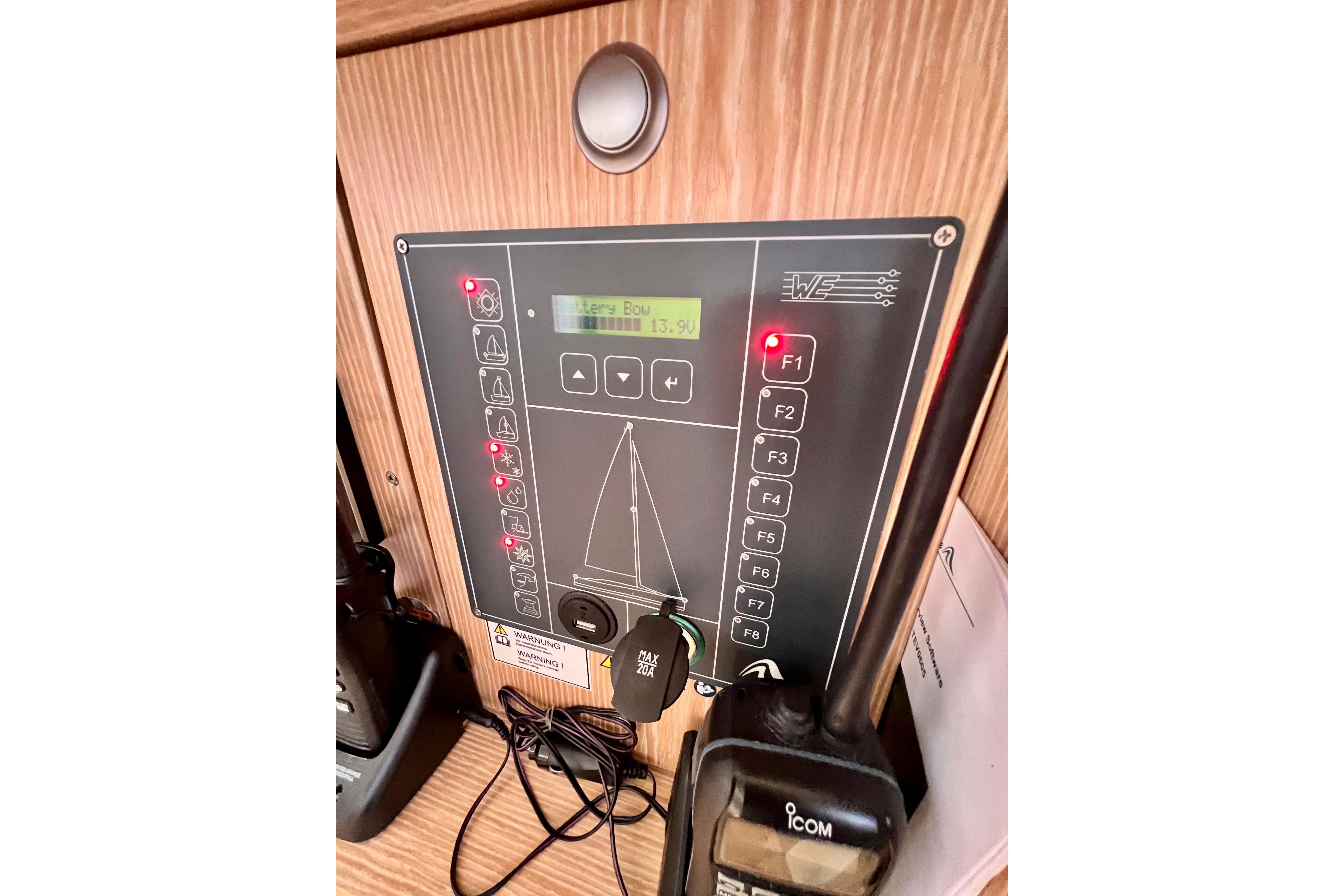 Control panel on a 2016 Hanse 455 yacht, featuring navigation and system indicators.