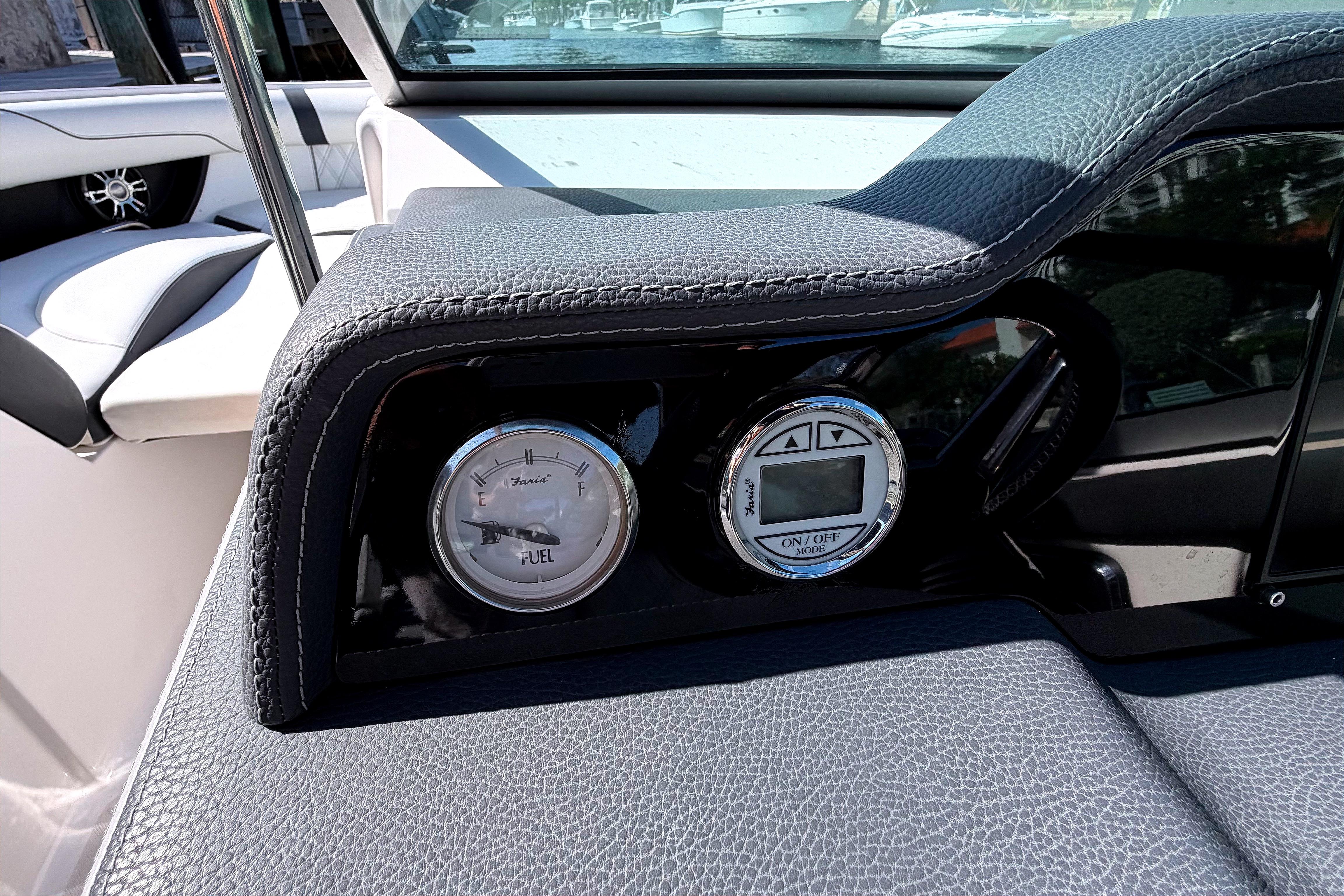 2020 Regal 2300 Bowrider dashboard with fuel gauge and digital display.