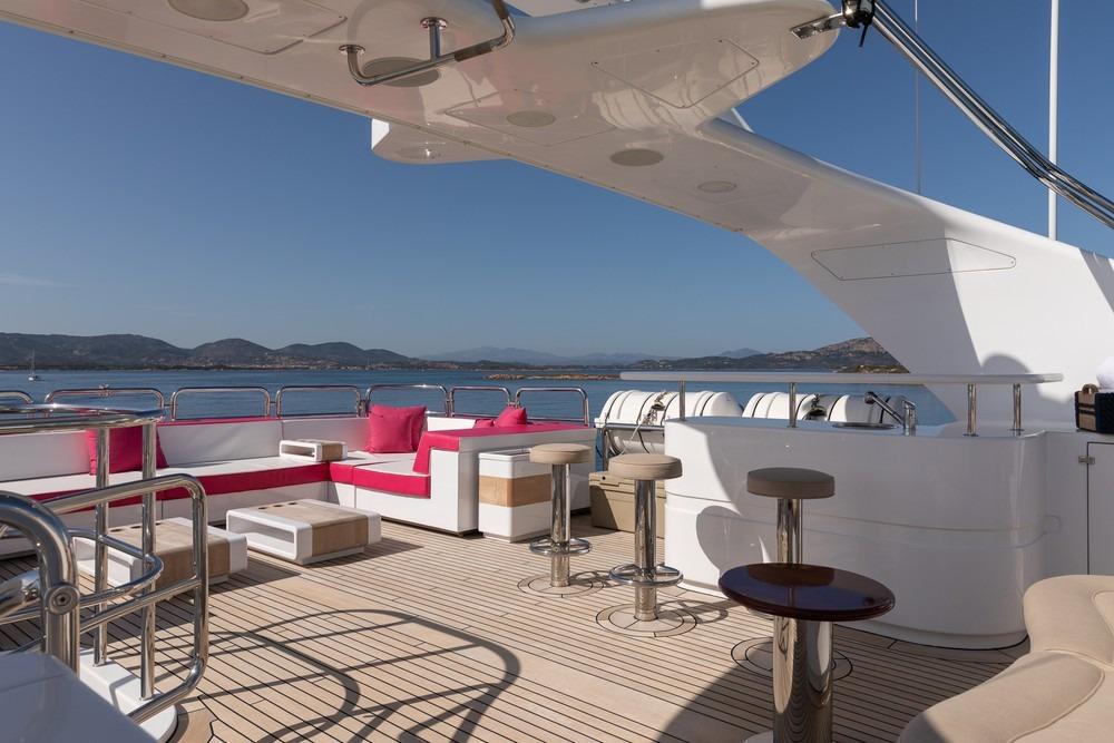 Luxurious 2008 Benetti Classic 120 yacht deck with modern seating and ocean view.