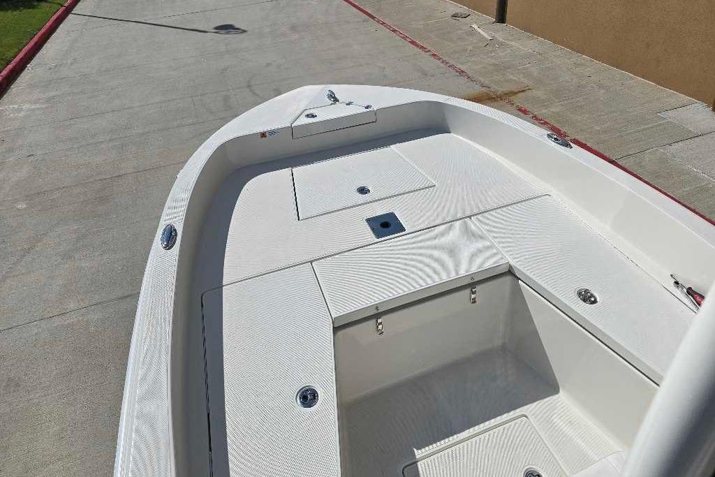 2025 Ranger 2360 Bay boat deck, featuring spacious storage compartments and sleek design.
