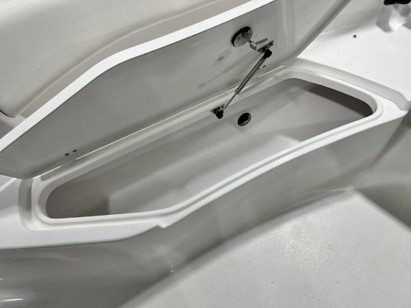 Storage compartment in 2023 Tidewater 232 CC Adventure boat.