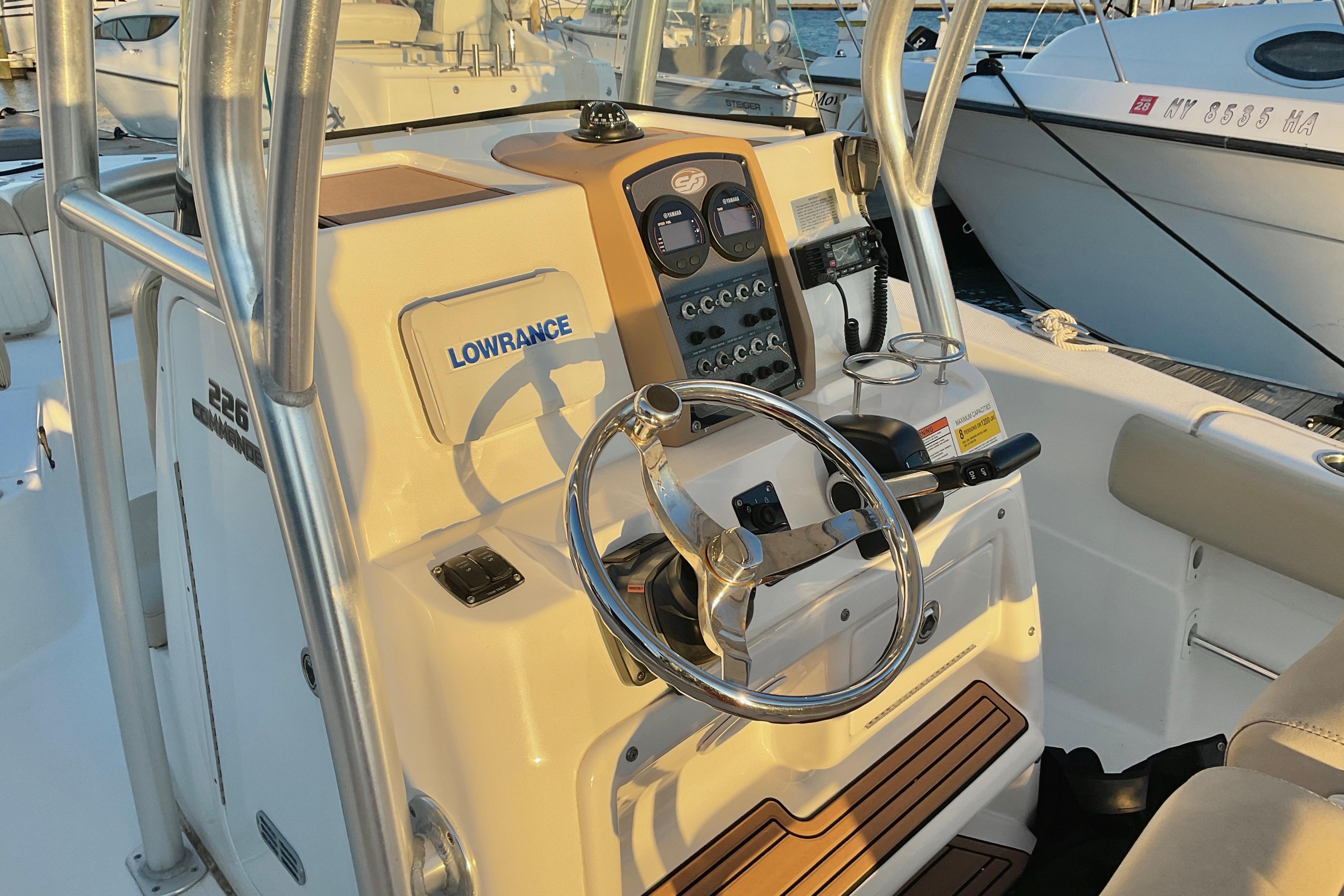 2016 Sea Fox 226 Commander boat console with steering wheel and Lowrance equipment.