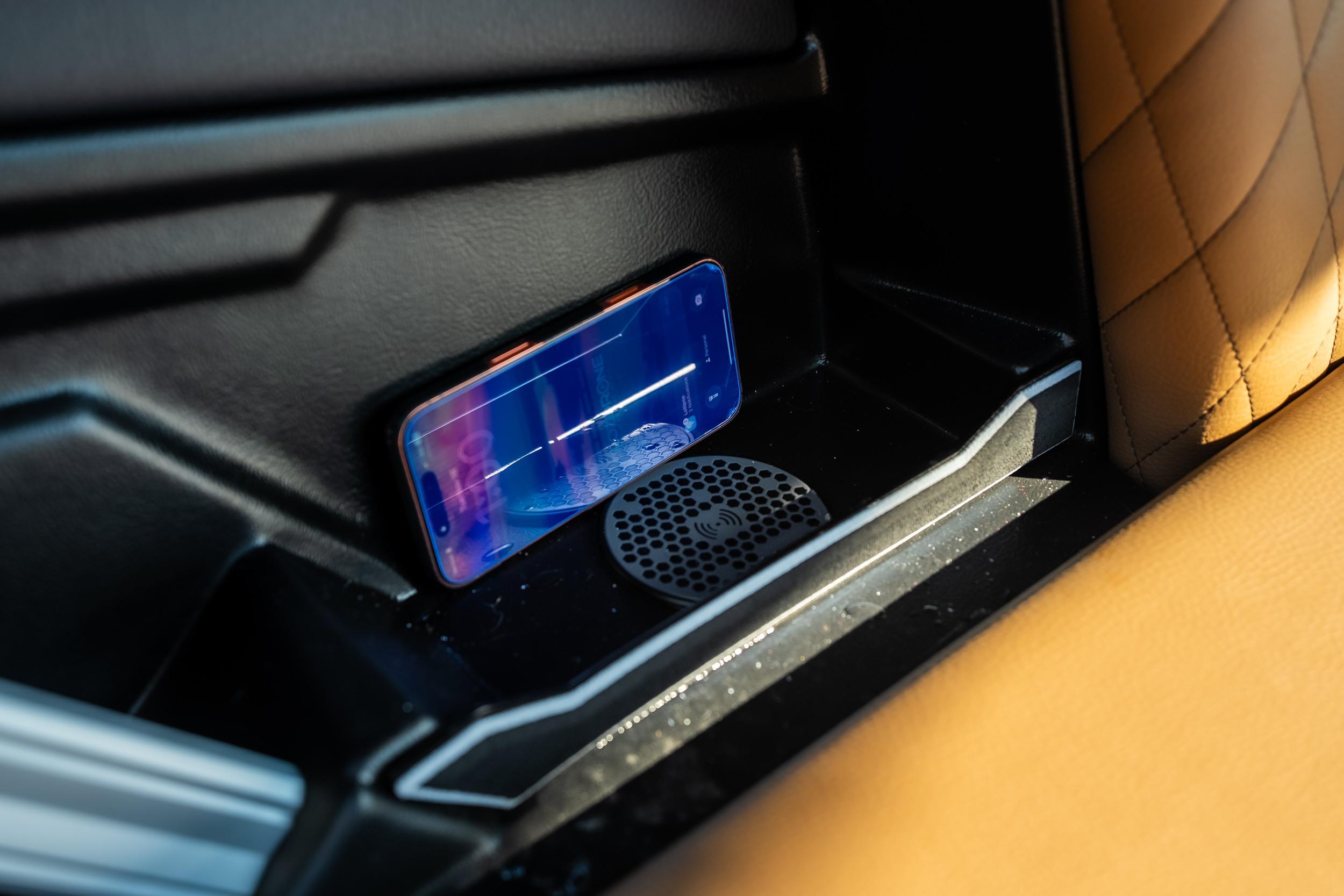 2026 Tigé Z3 interior with smartphone and wireless charging pad.