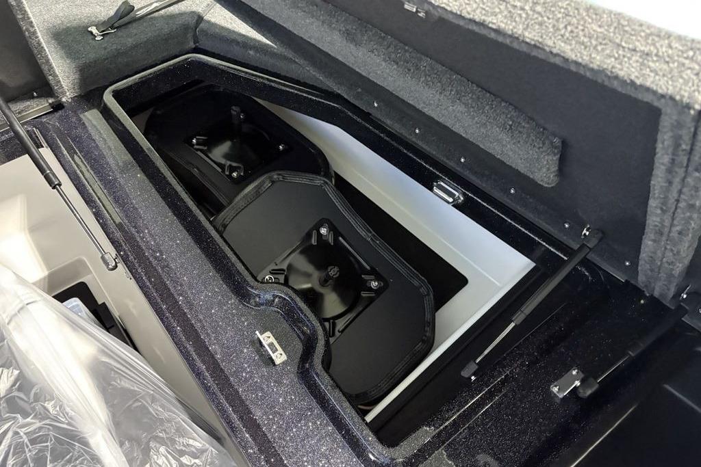 2026 Skeeter ZXE21 boat storage compartment with dual battery setup.