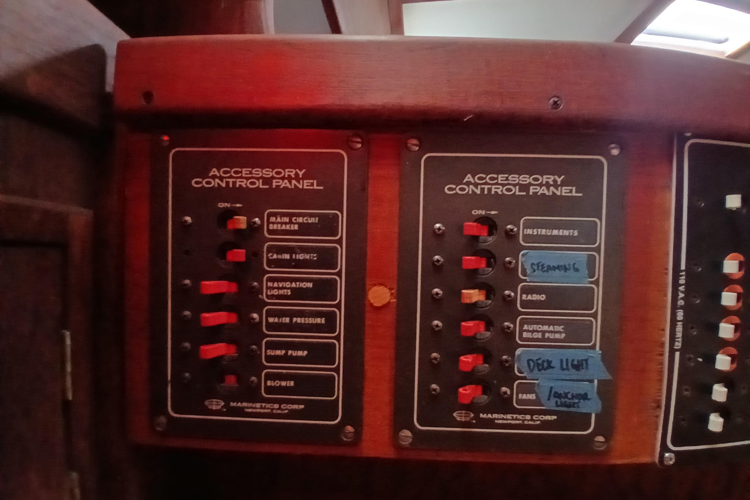 1977 Tartan 37 accessory control panel with labeled switches and circuit breakers.