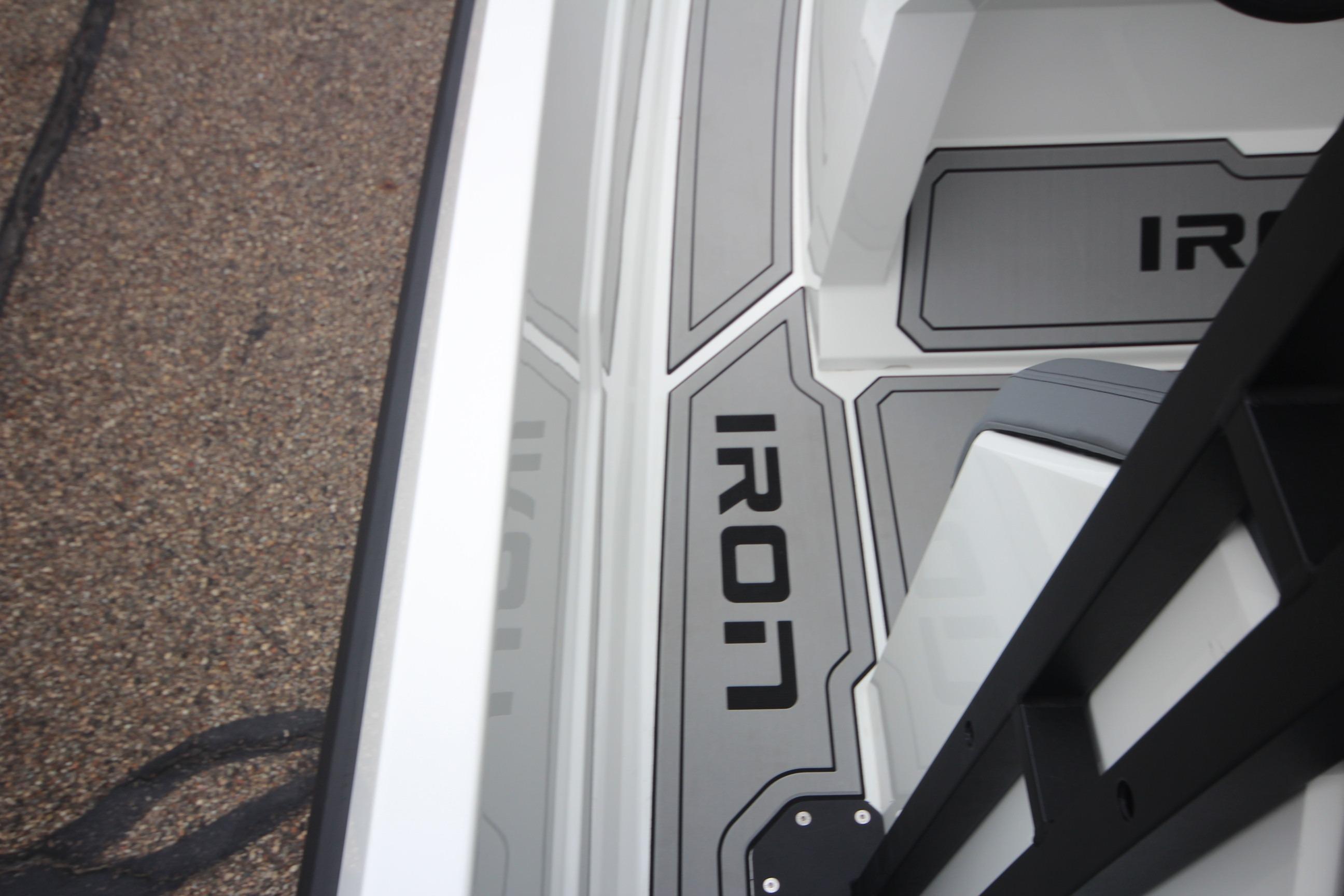 2026 Iron 767 T-top boat deck with sleek design and branding.
