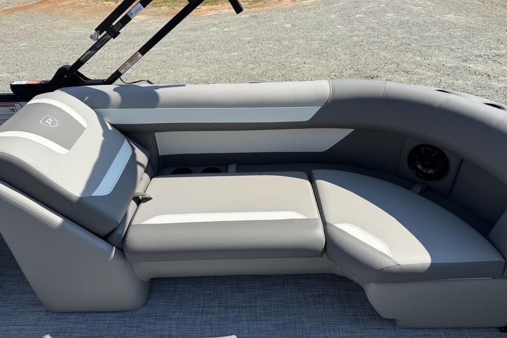 2026 Premier 220 Sunscape RF boat interior with gray cushioned seating.
