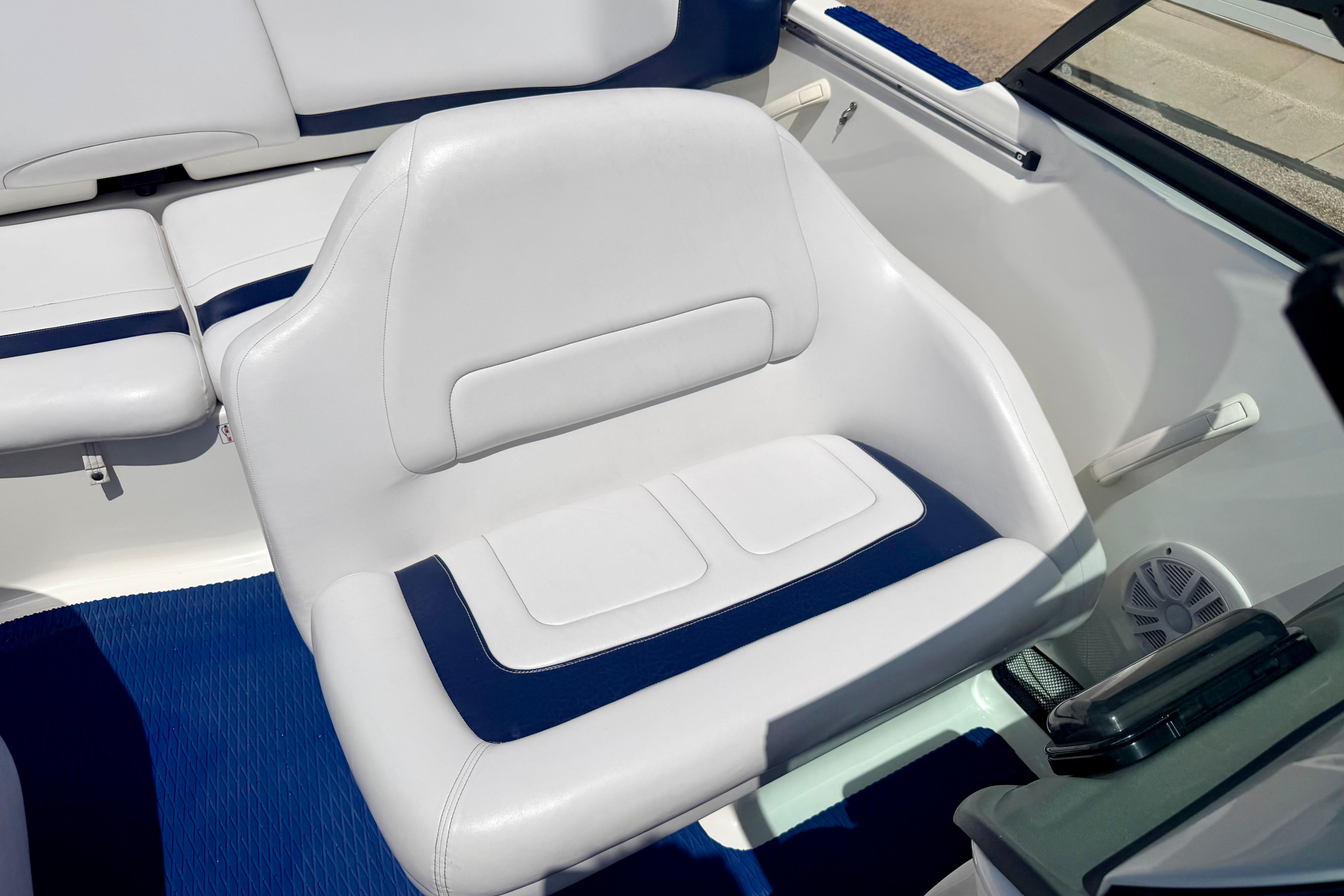 2004 Bombardier SEADOO Utopia 185 boat interior with white and blue seating.
