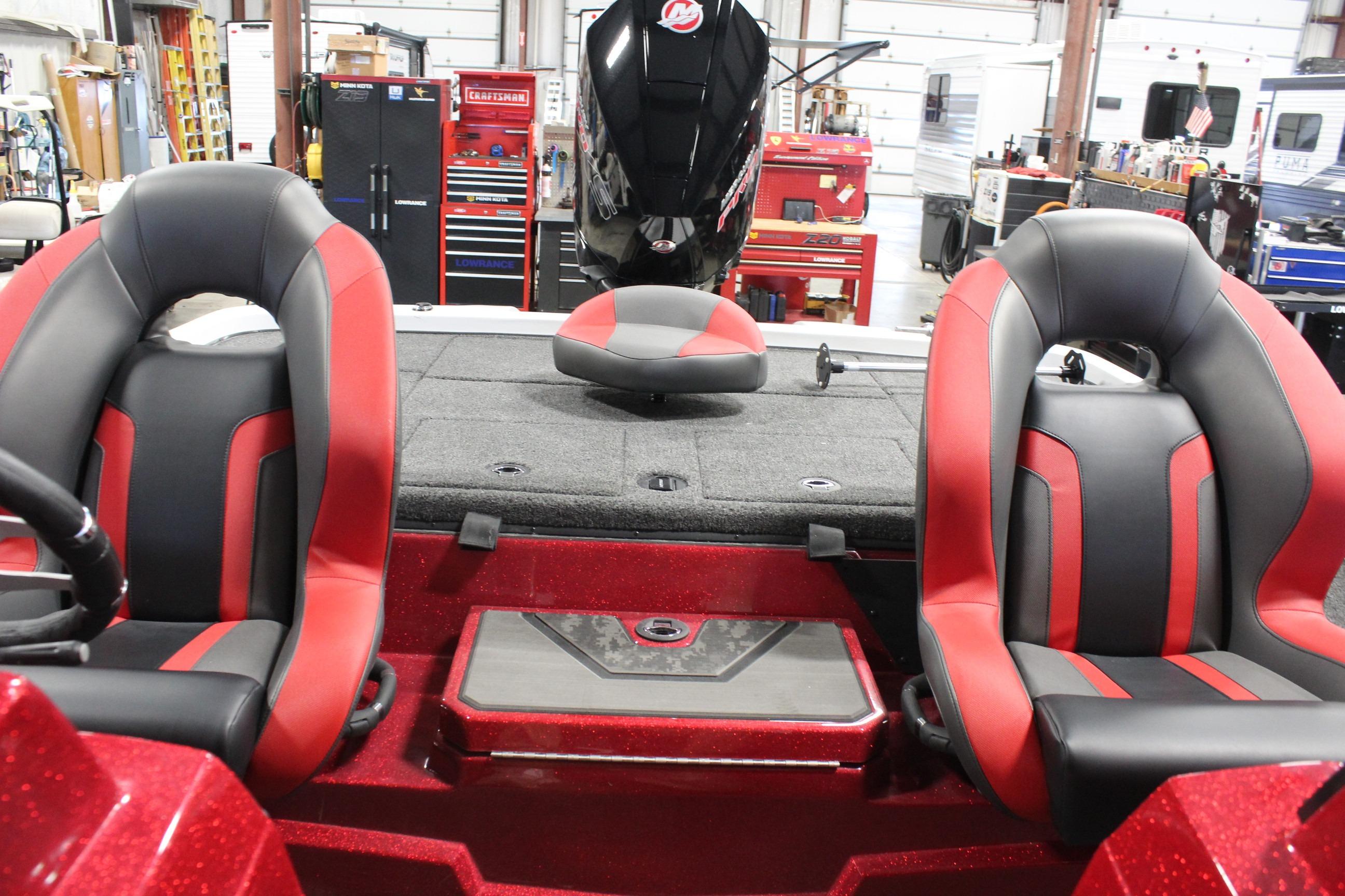 Interior of 2026 Nitro Z19 XL Pro boat with red and black seating.