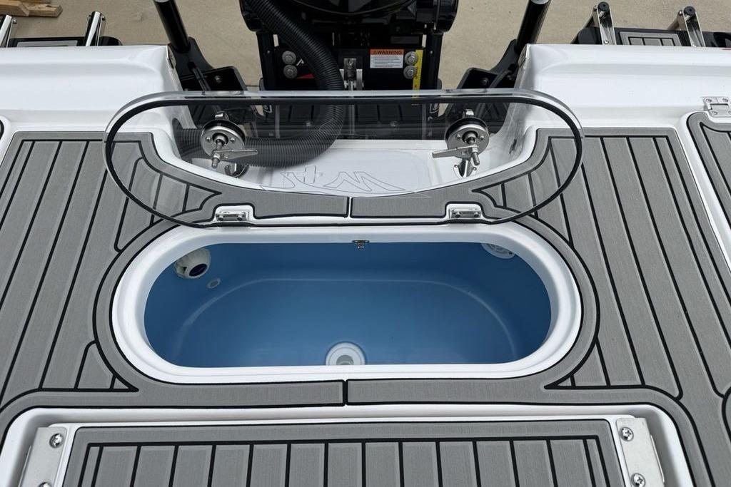 Livewell on 2026 Tidewater 2500 Carolina Bay boat, featuring sleek design and functionality.