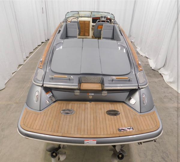 2021 Chris-Craft Corsair 34 boat in a showroom.
