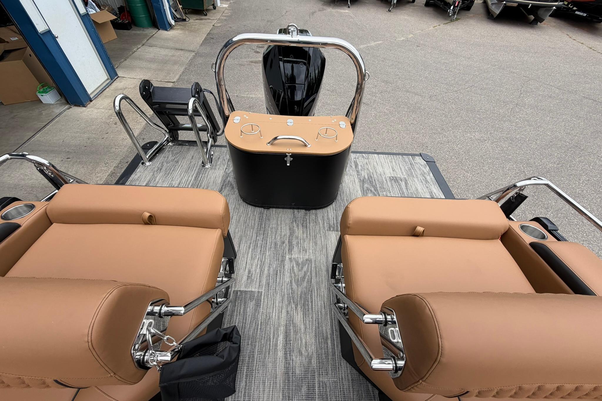 2026 Avalon Catalina Quad Lounge Shift boat interior with tan seating and sleek design.