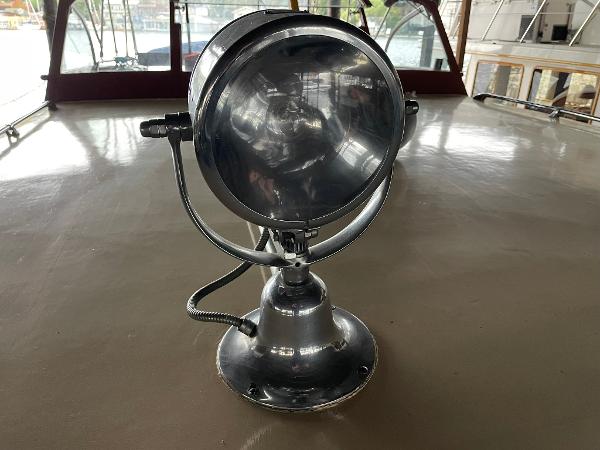 Vintage spotlight on 1951 Chris-Craft Catalina boat deck.