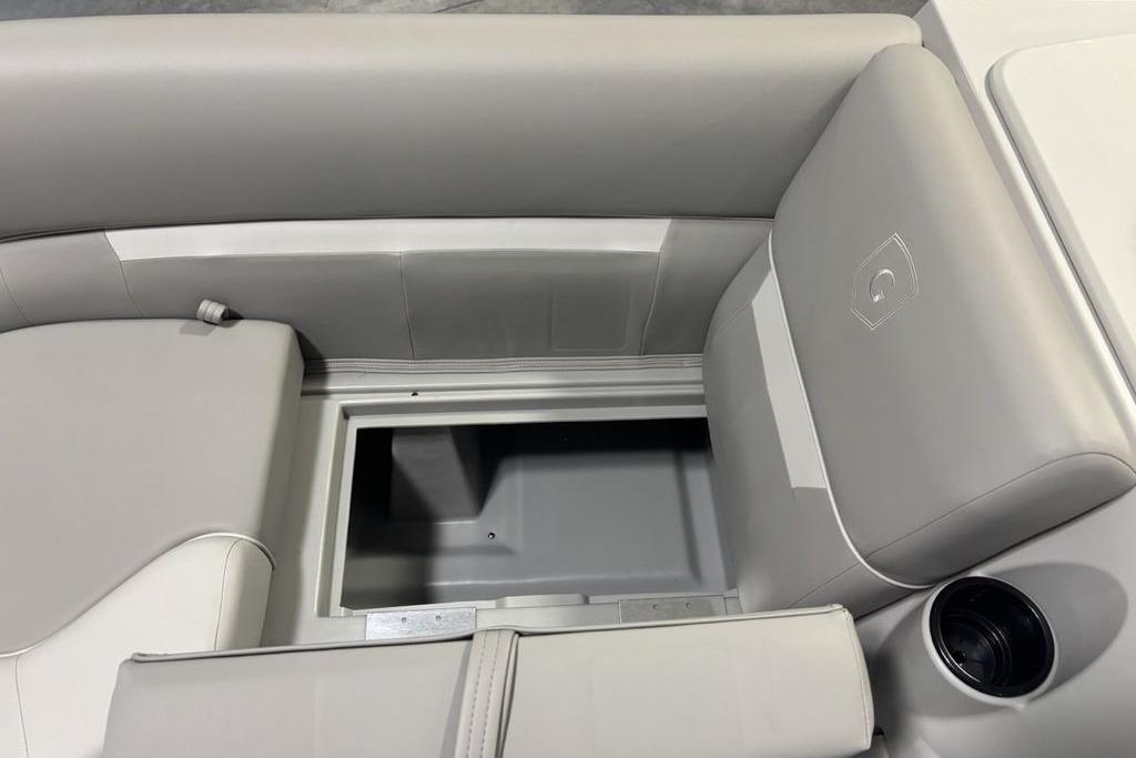 2026 Godfrey Xperience 2086 SFLX boat seat with storage compartment and cup holder.
