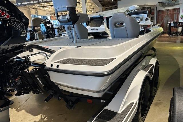 2026 Nitro Z19 XL Pro boat in showroom, featuring sleek design and dual seats.