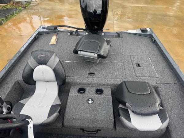 2025 Crestliner XF 179 boat interior with gray seating and storage compartments.