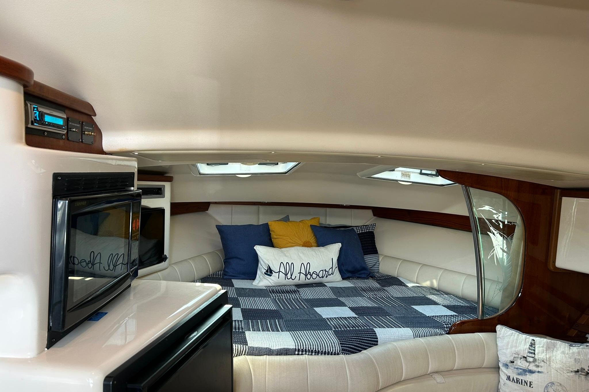 Interior of 2007 Grady-White Express 360 boat with cozy bed and modern amenities.