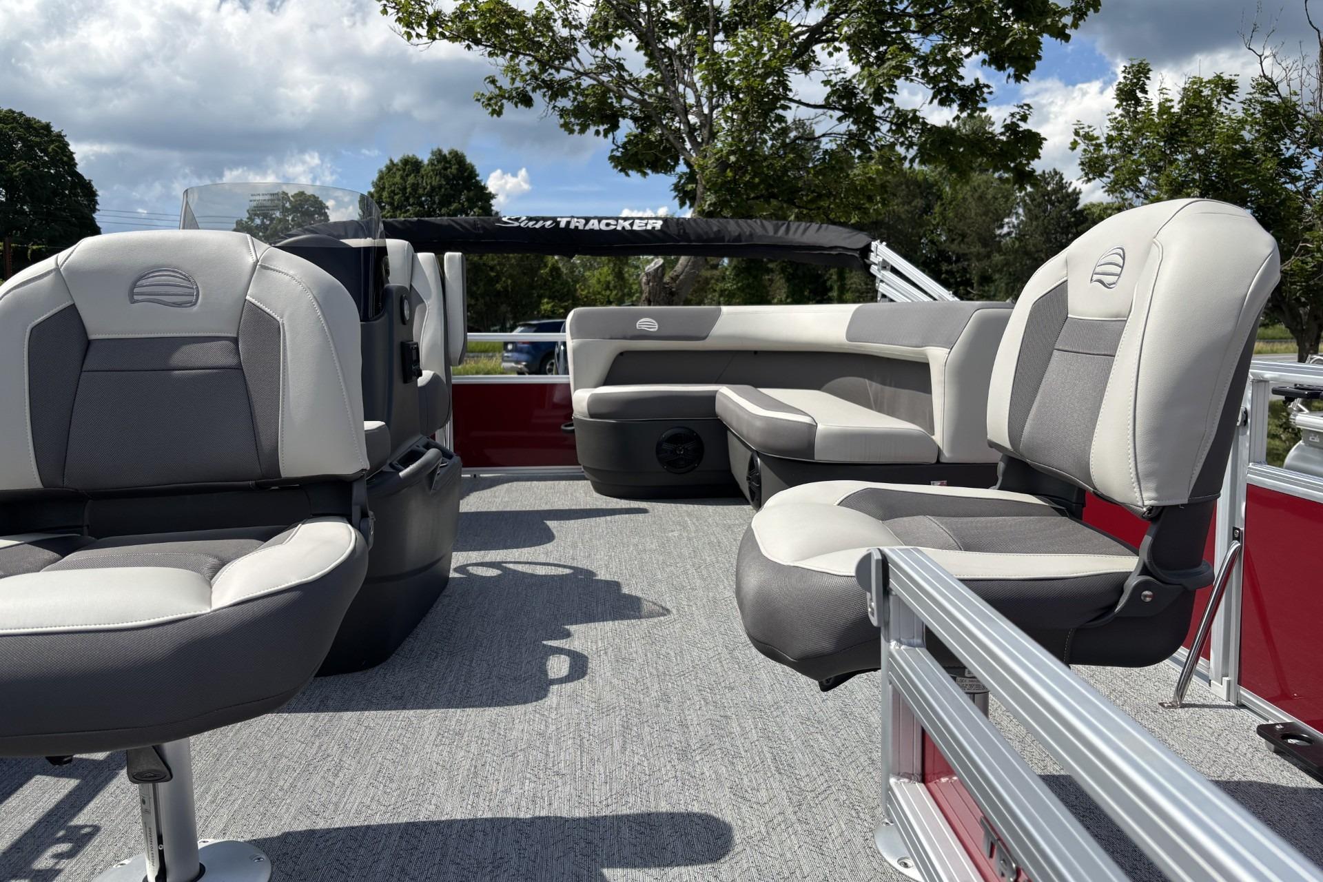 2026 Sun Tracker Bass Buggy 16 XL Select pontoon boat interior with cushioned seating.
