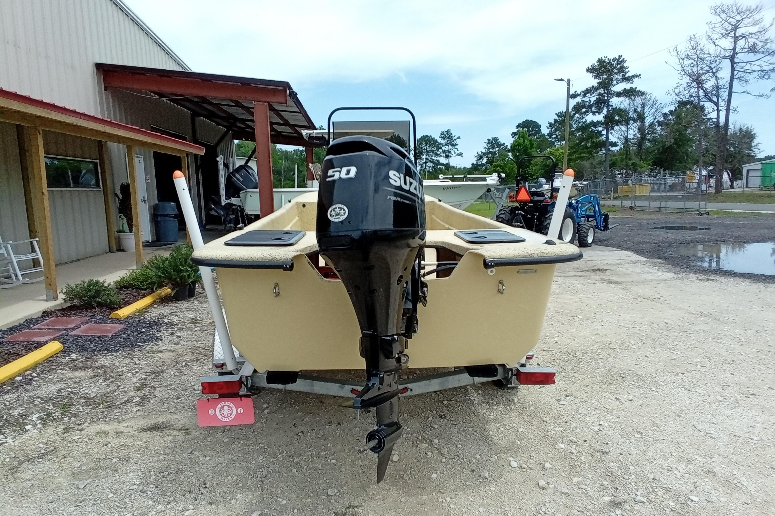 2025 Fibercraft F17 boat with Suzuki 50 outboard motor on trailer.