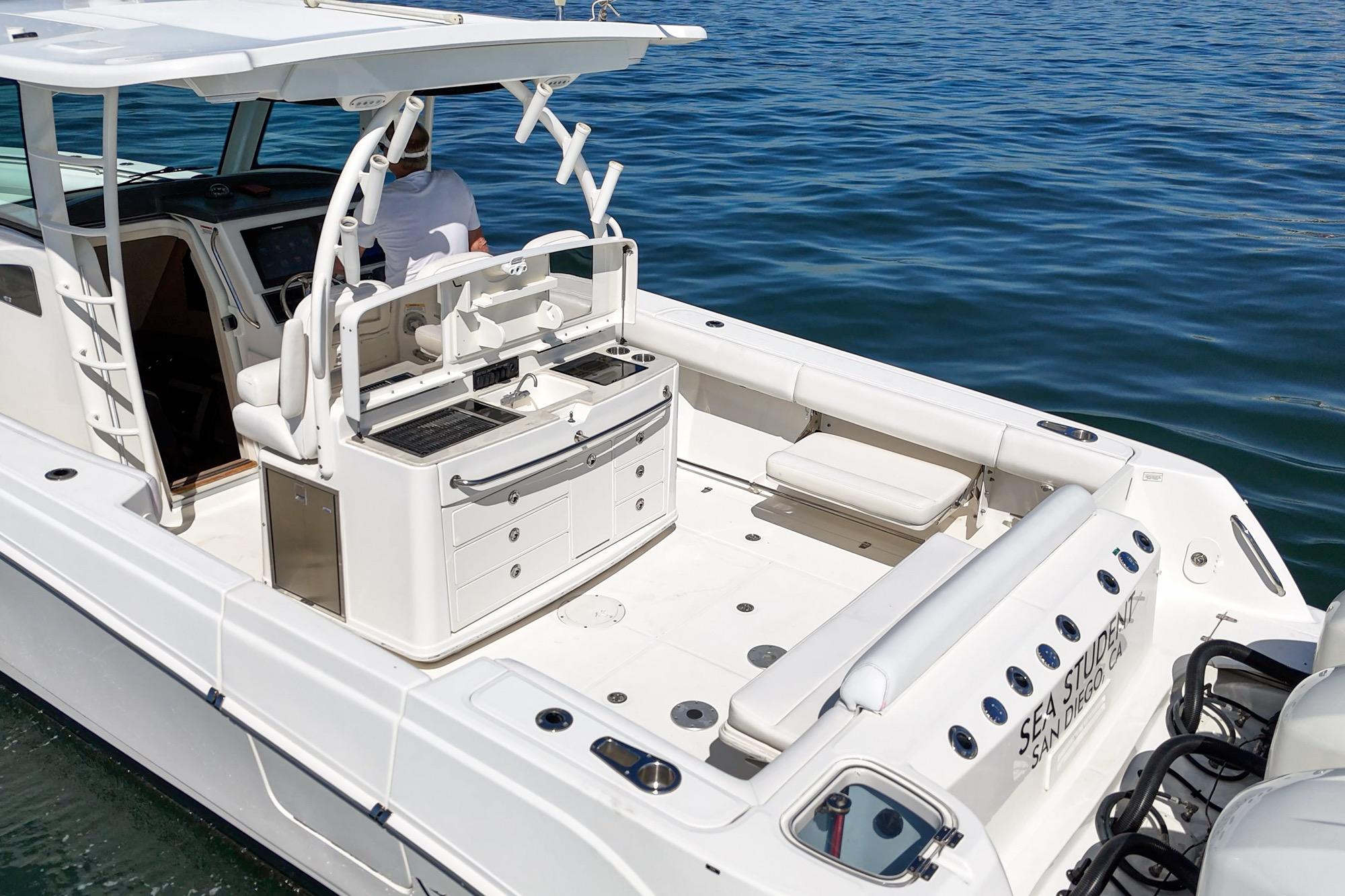 2015 Boston Whaler 370 Outrage boat with spacious deck and modern amenities on the water.