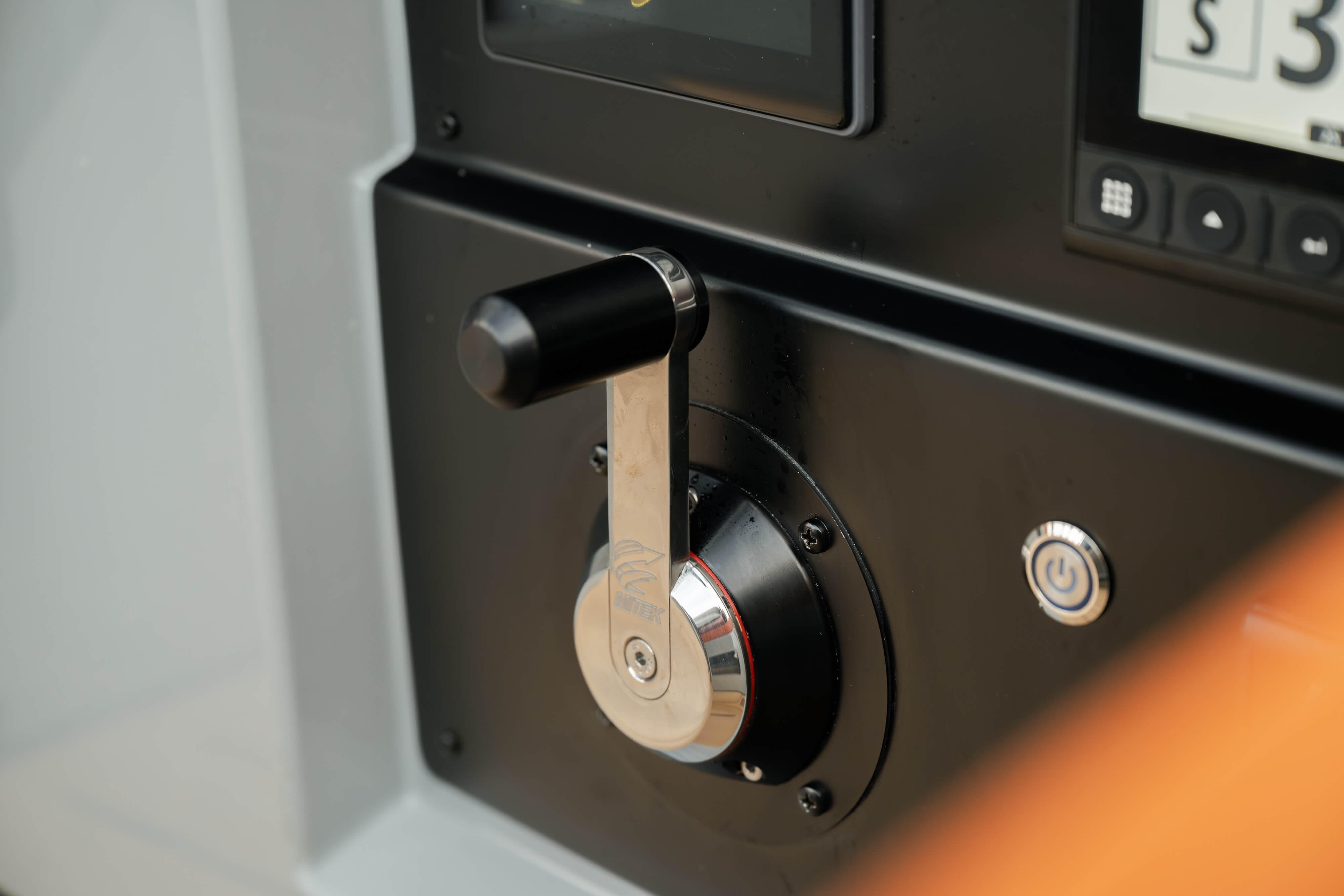 Control panel of 2026 Saffier SE 28 Leopard yacht with lever and power button.