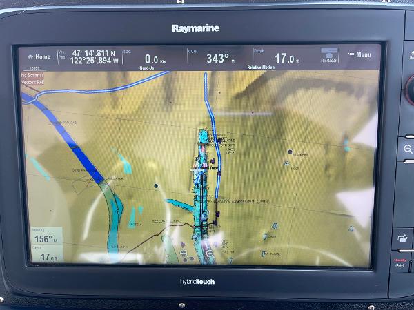 Raymarine navigation display on 2003 Tiara Yachts 3500 Open, showing map and coordinates.