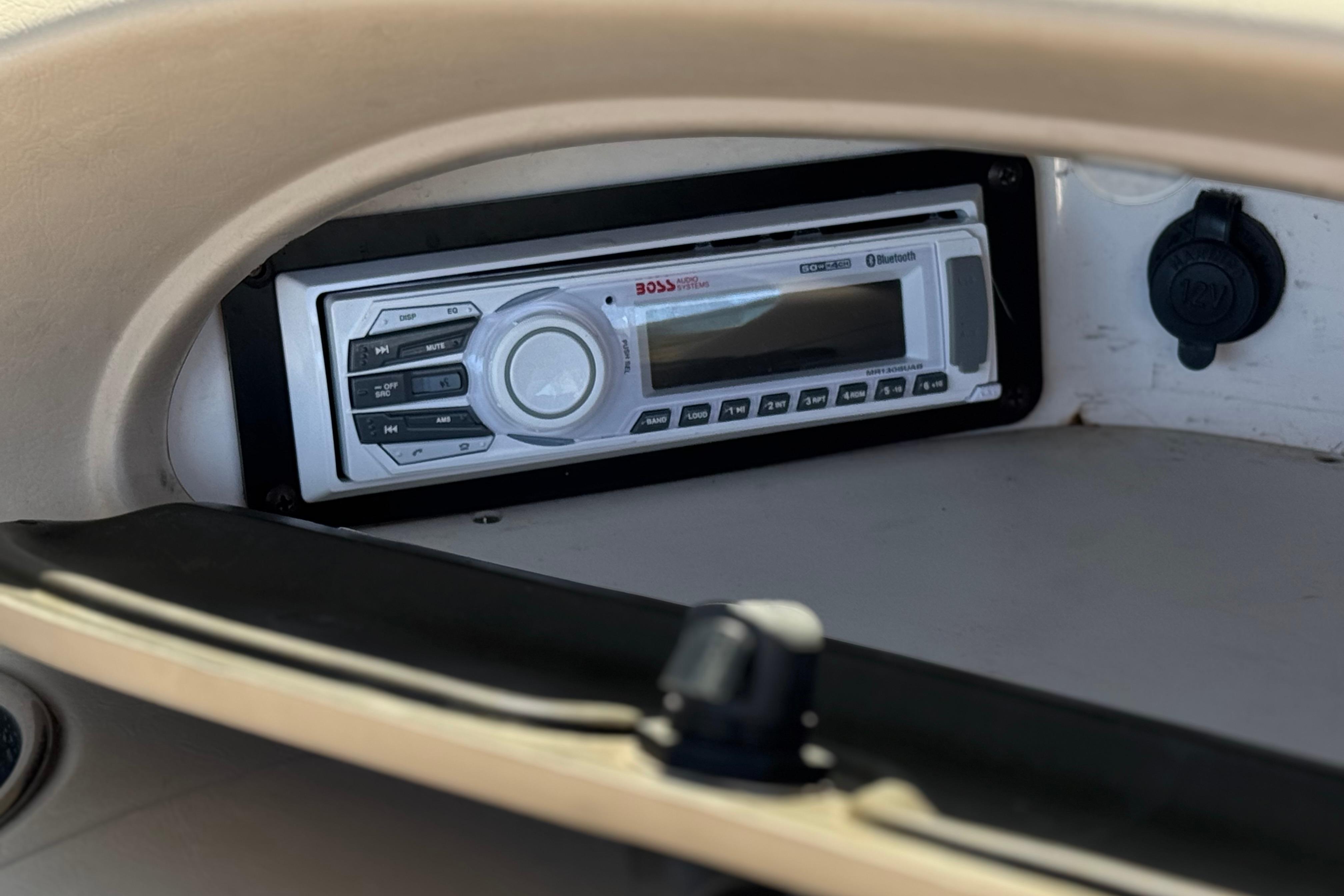 Boat stereo system in a 2002 Chaparral 186 SSi, featuring Bluetooth connectivity.