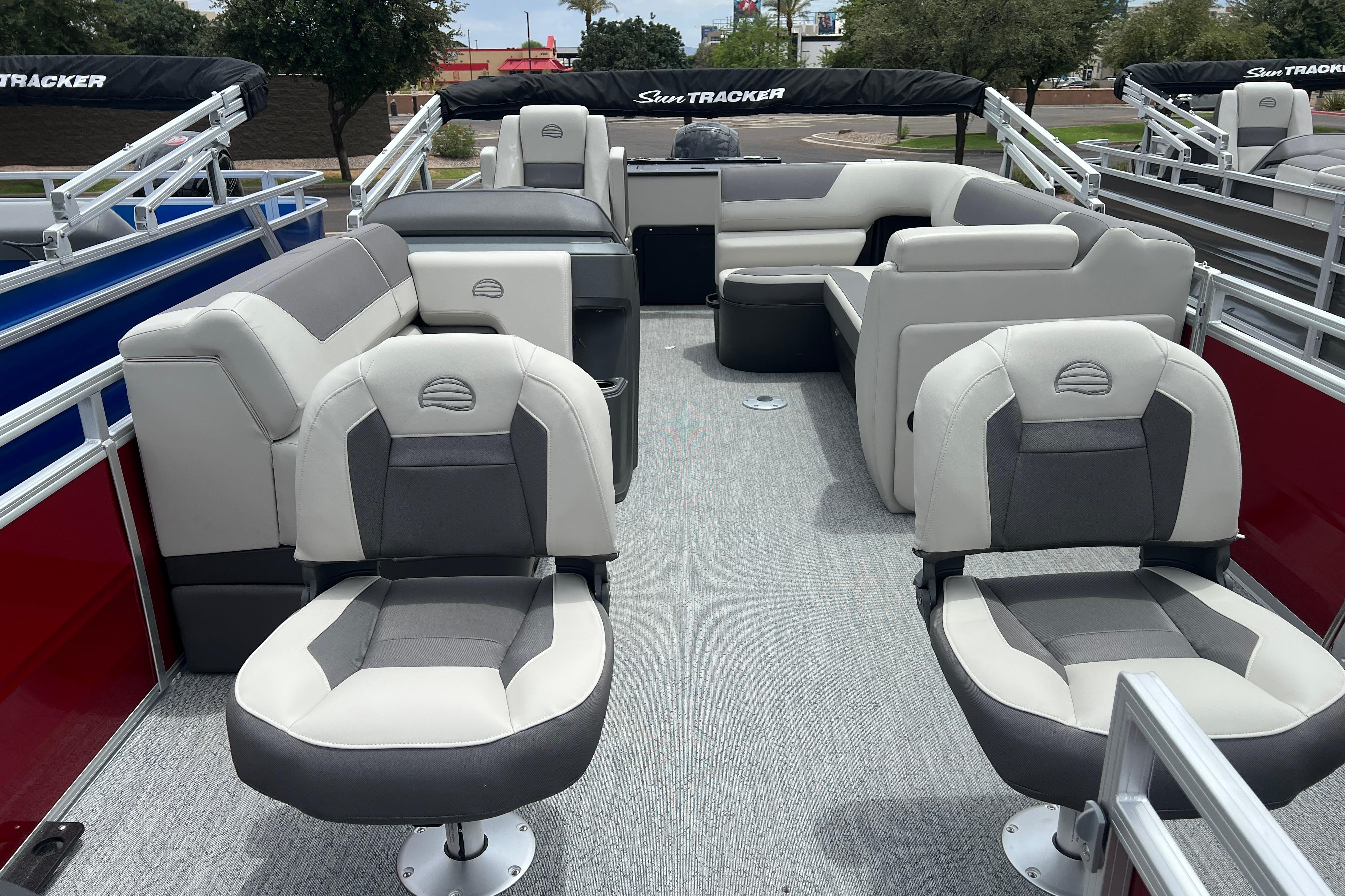 2026 Sun Tracker Fishin' Barge 22 DLX interior with comfortable seating and modern design.
