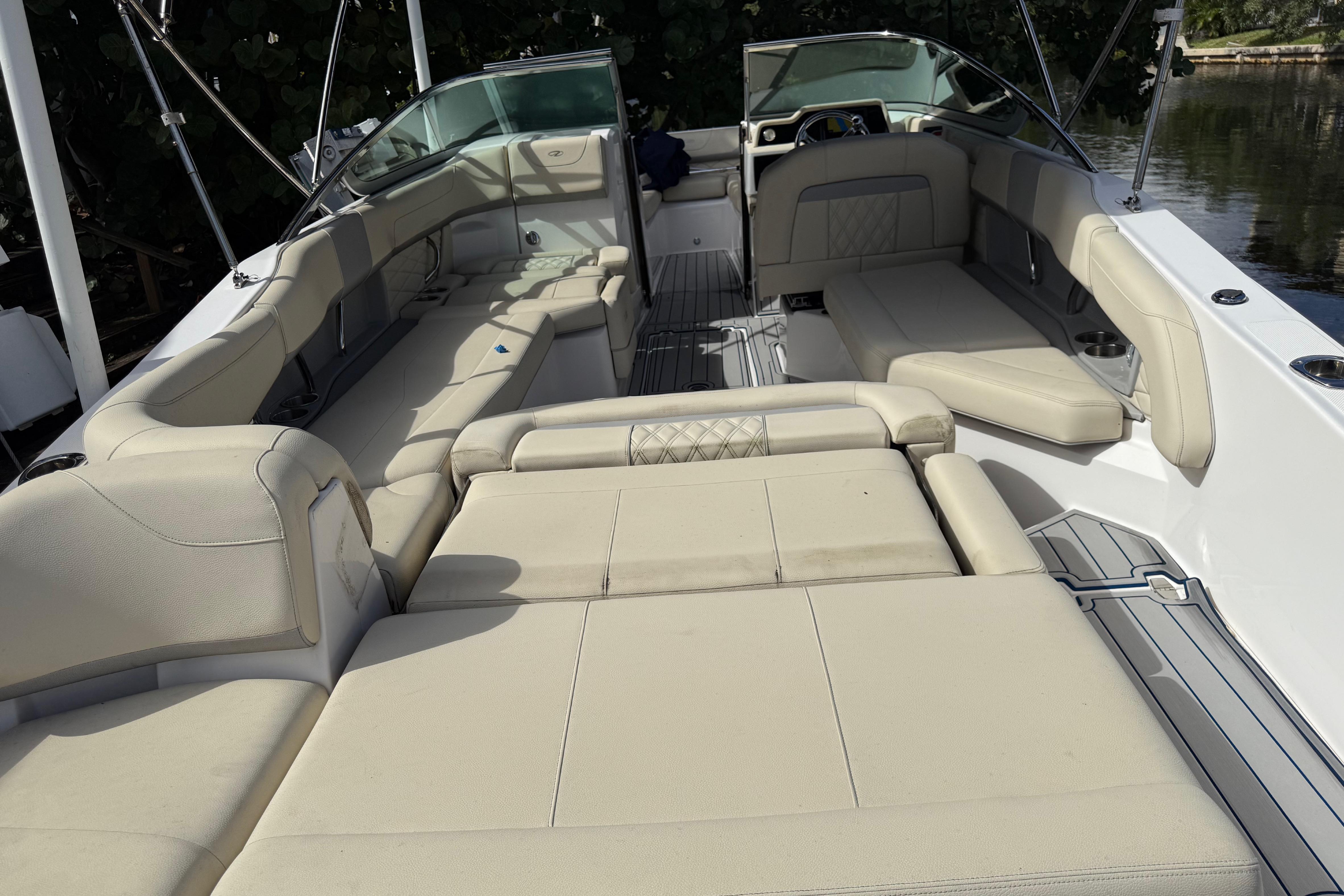 Luxurious interior of a 2021 Regal 26 OBX boat with spacious seating.