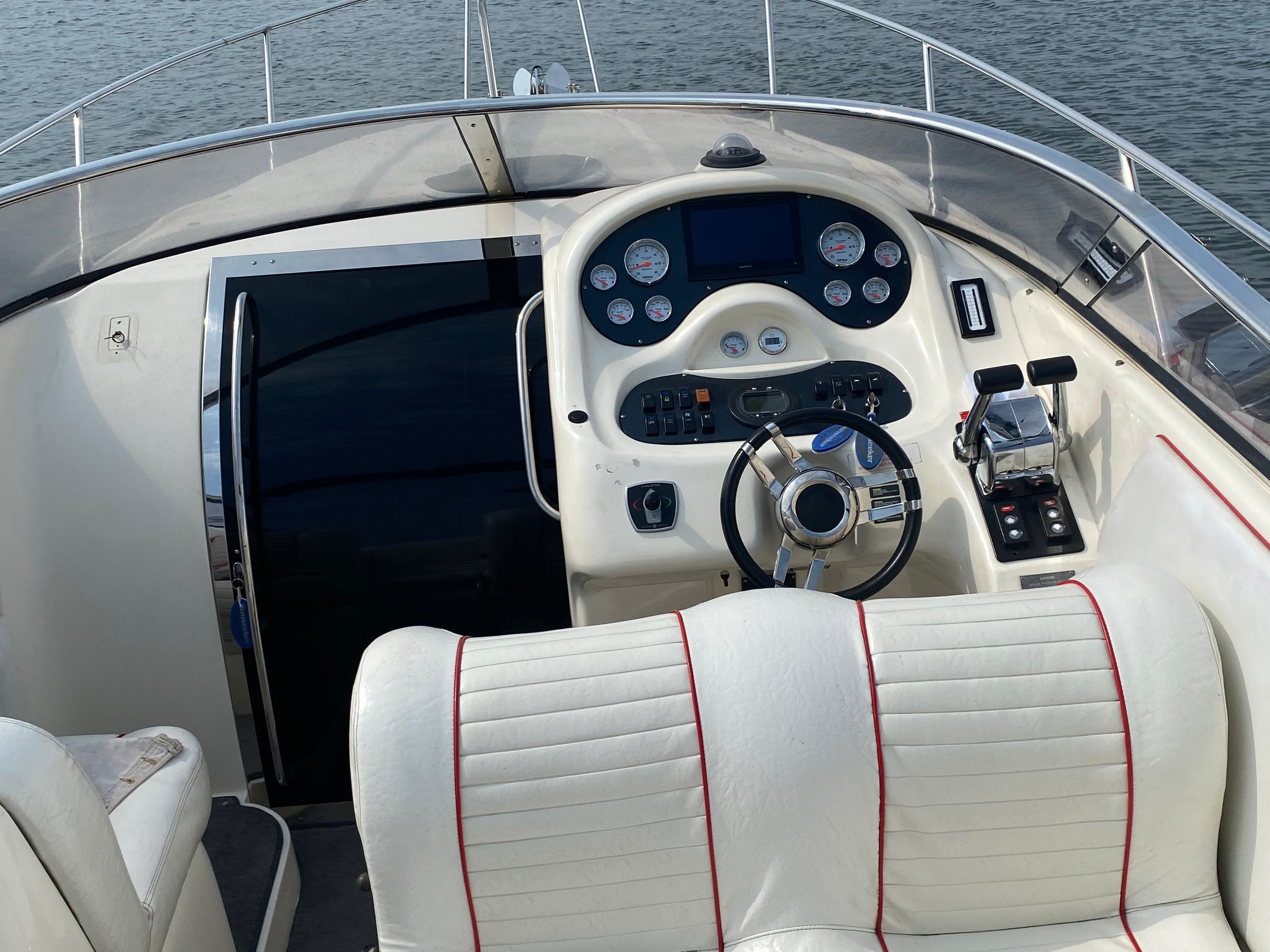 Cockpit of a 1994 Sunseeker Hawk 31 on the water.