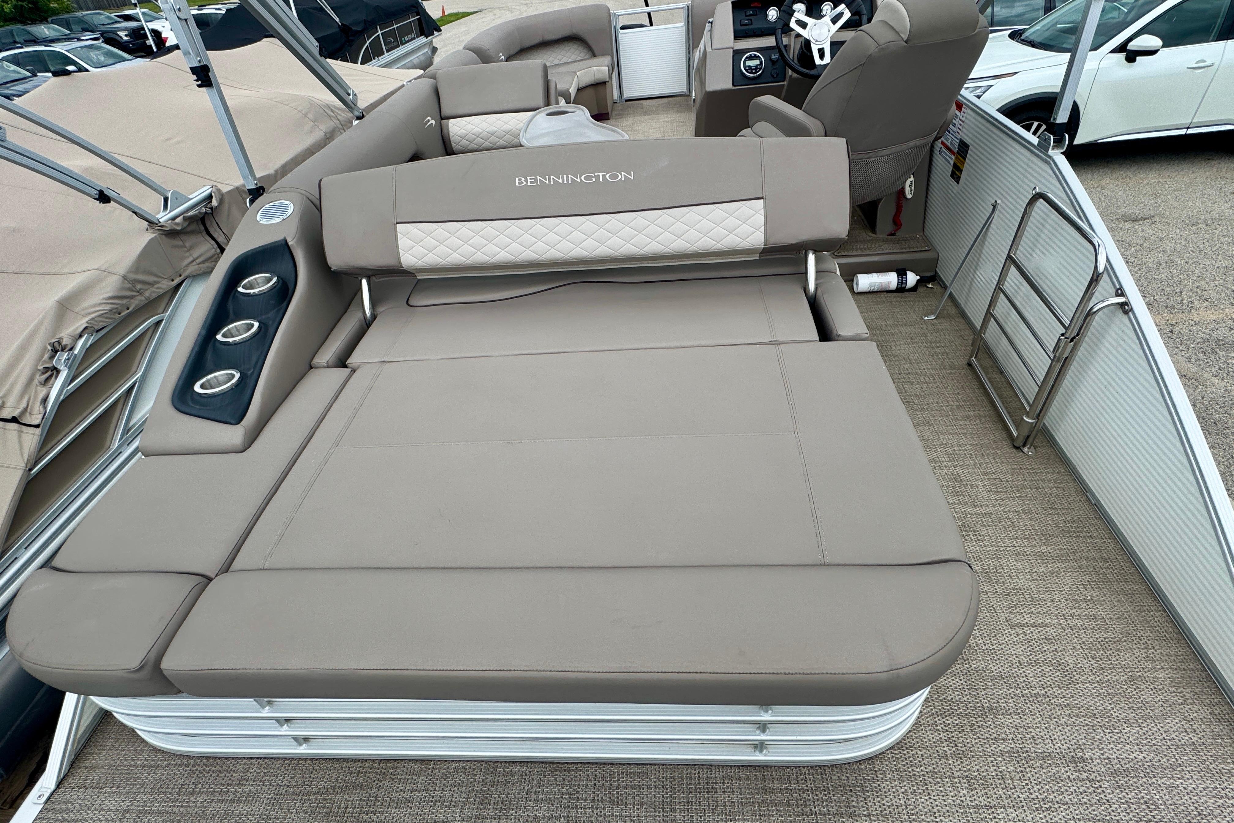 2019 Bennington SX 22 SSBXP pontoon boat with spacious seating and modern design.
