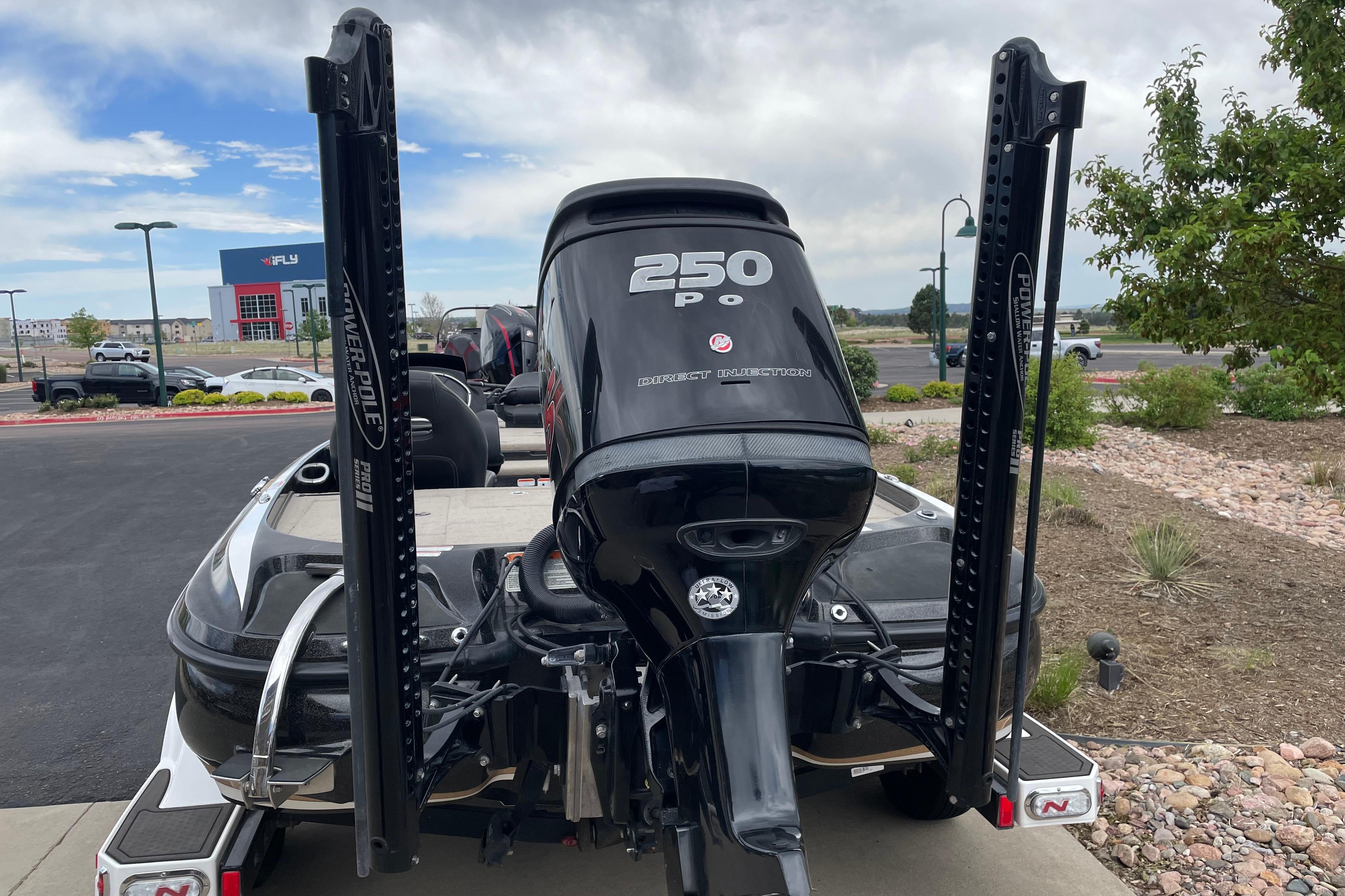 2016 Nitro Z21 boat with 250 Pro motor, parked outdoors.