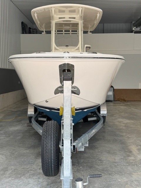 2020 Jupiter 26 FS Center Console on trailer in garage.