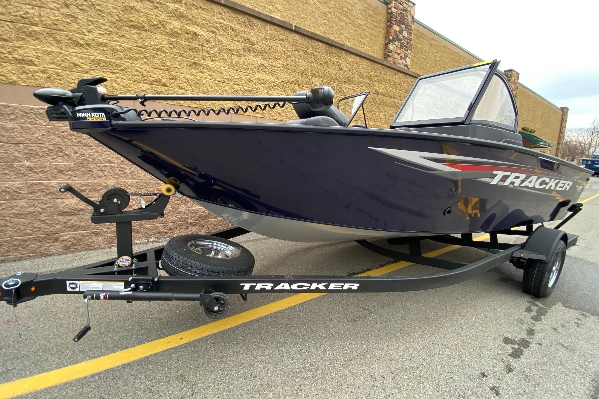 2026 Tracker Pro Guide V-175 WT boat on trailer, featuring sleek design and Minn Kota trolling motor.